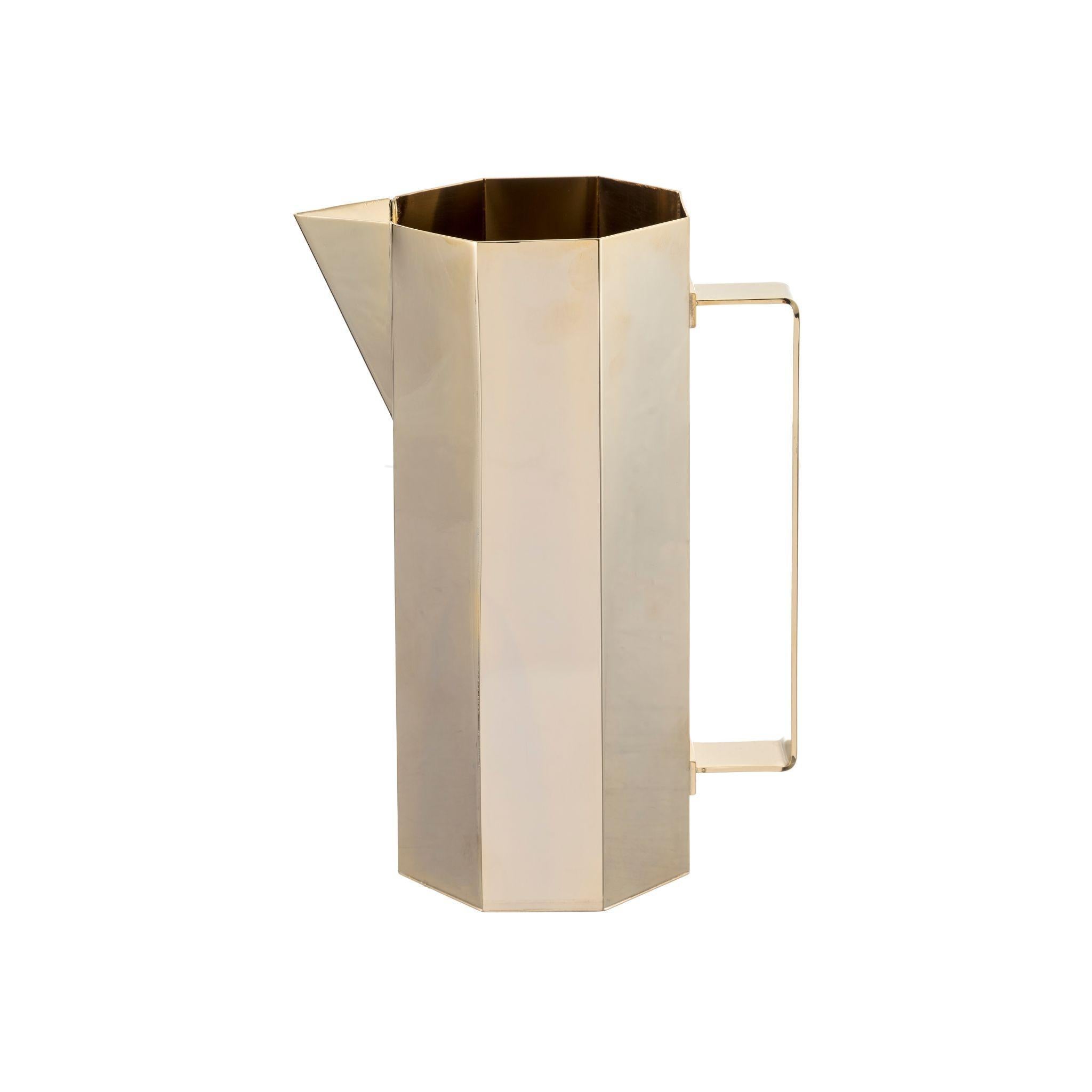 Elevate your table setting with our hexagonal classic brass jug. Made from high-quality brass and featuring a unique hexagonal shape, it adds sophistication to any decor. With a sturdy handle and spout for easy pouring, it is ideal for serving