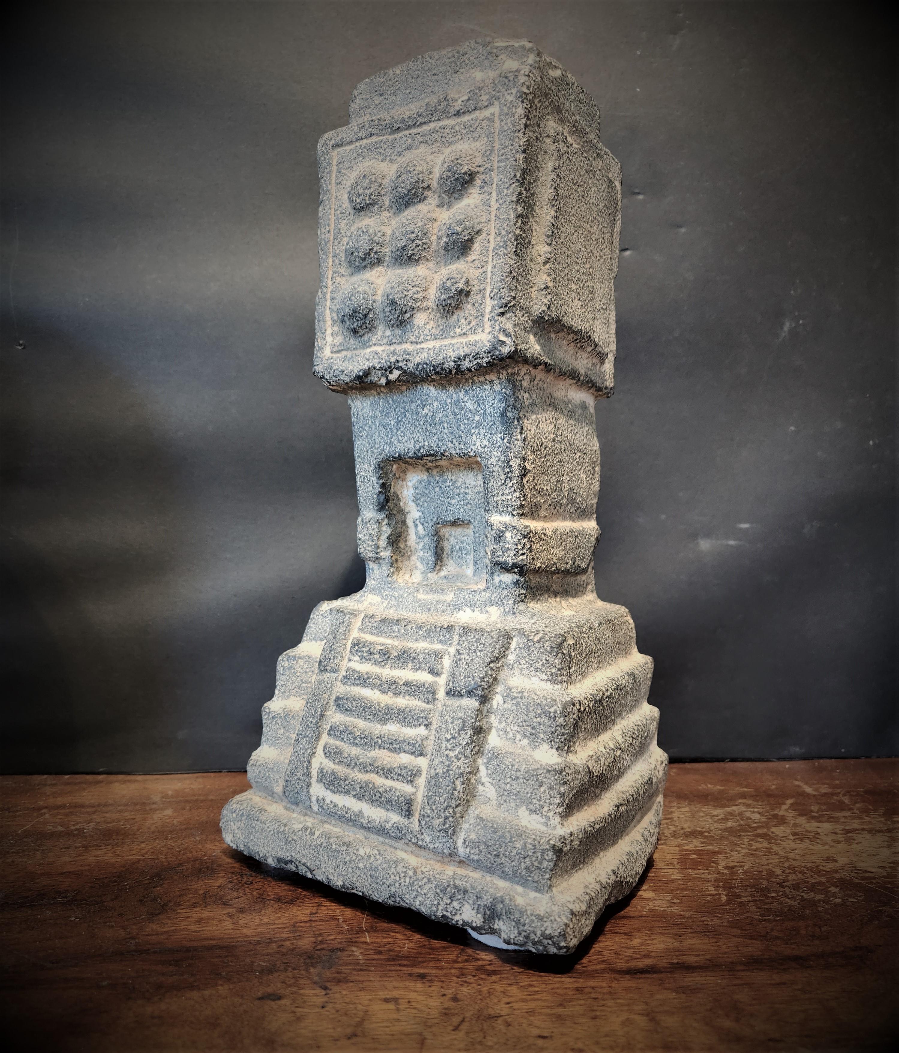 An extremely rare Basalt model of one of the main temples in the Aztec capital of Tenochtitlan, perhaps the Templo Mayor itself, The Great Temple.

As a way of reinforcing the centralized power of the Aztec Empire and its Religious institutions, 