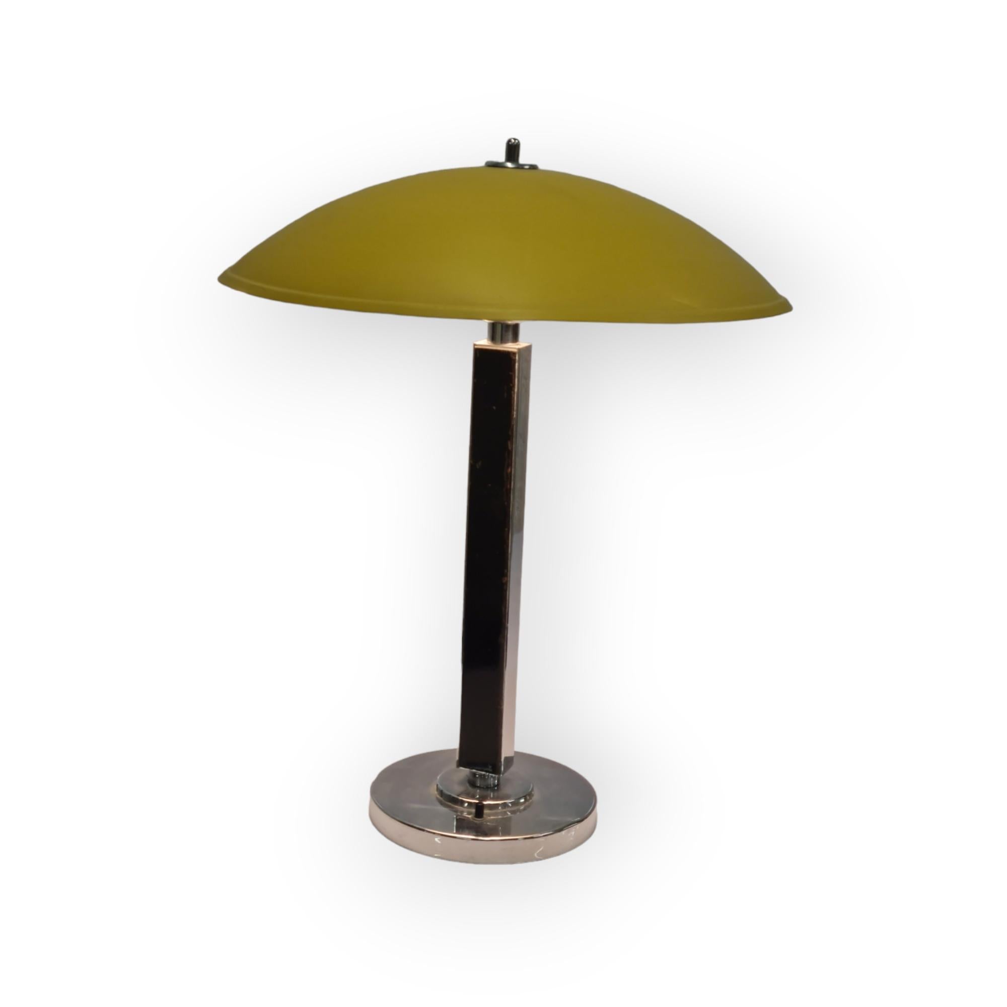 This is an exceedingly rare version of the Gunilla Jung table lamp designed in 1936-37 for Orno and exhibited at the 1937 Paris world exposition.

This fine example is believed to be a unique version of this lamp due to the strickingly beautiful