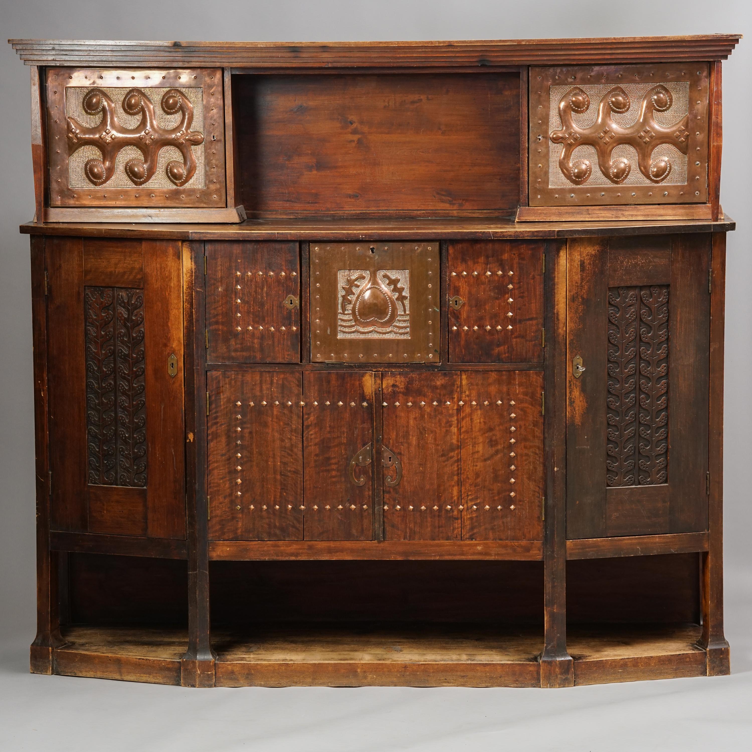 Jugend cabinet by Eliel Saarinen from the early 1900s. Originally designed to the Nordic Share Bank. The same symbol can be found in the archive pictures of the bank. Solid wood with copper details. Beautiful craftsmanship. Good vintage condition,