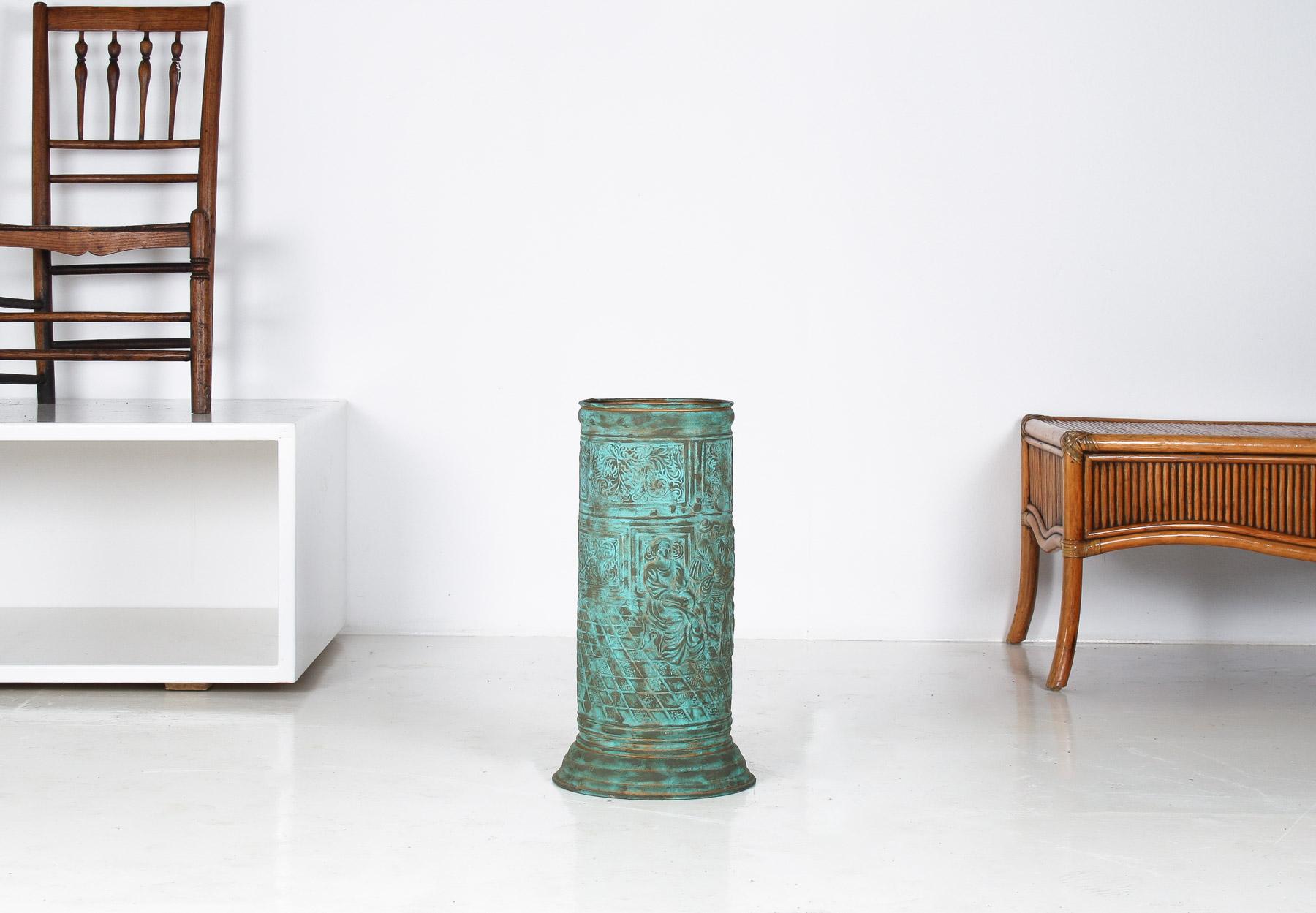 A good quality vintage 1950s brass stick umbrella stand. Crafted from high-quality brass, this piece has a verdigris copper patina finish that has bene added which gives the piece a character and charm.  The round design offers a classic look,
