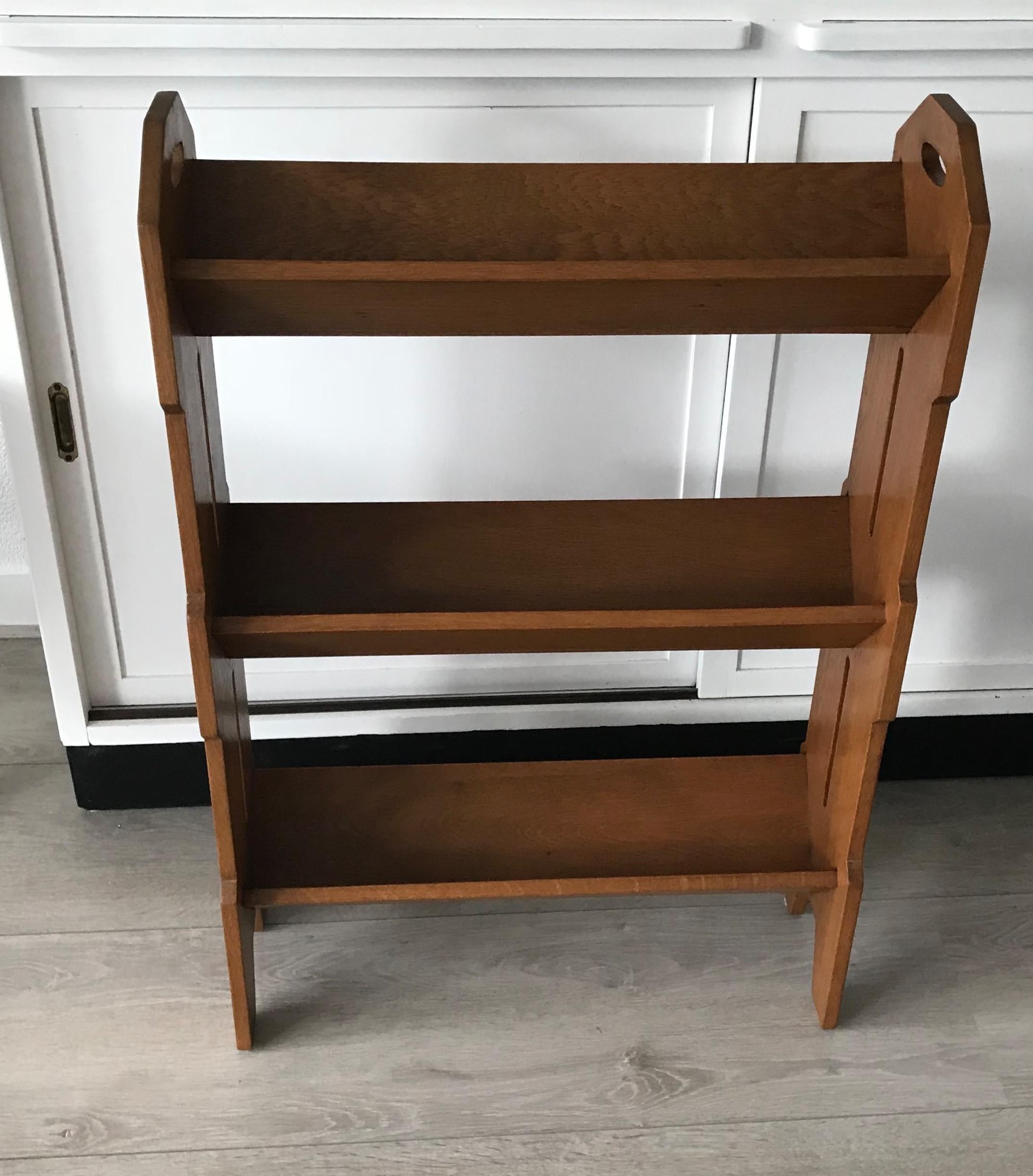 Stylish antique from circa 1910.

This rare, three-tier bookcase could be the perfect finish to a small area for reading, rest and relaxation. However, this timeless design could also be used in an office setting for quick and easy access to books.