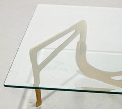 Excellente table basse en laiton et verre