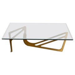 Excellente table basse en laiton et verre