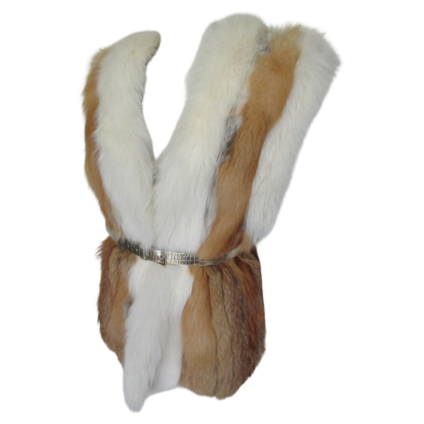 Exclusive Golden Island red/white fox fur vest

We offer more vintage fur items, view our frontstore

Details:
This vest has 2 pockets, 2 closing hooks and is very soft and supple and light to wear.
Size fits like a medium to large, please check