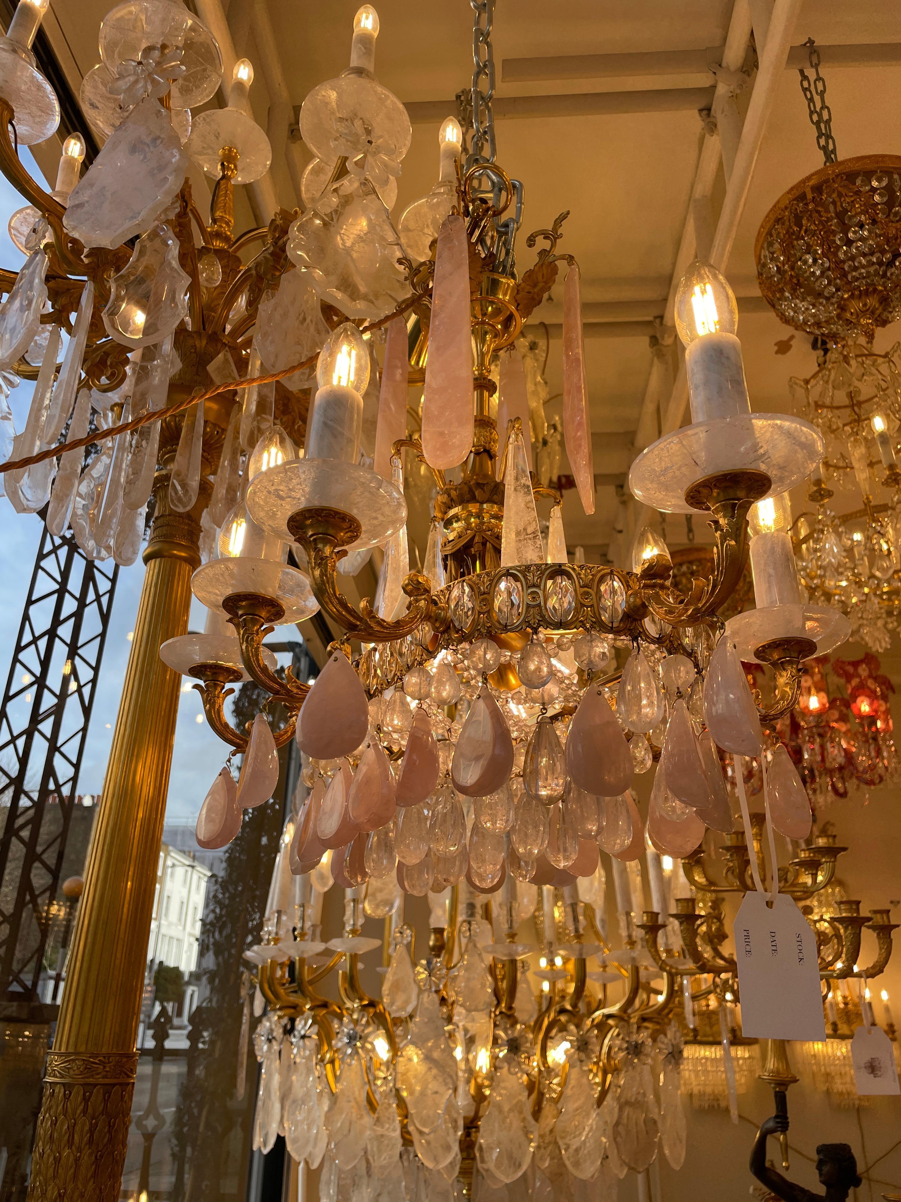 Lovely late 19th century french chandelier. Rare oval shape for the size of chandelier, gilt bronze with roze and clear rock crystals, 8 arms and total 10 lights. rewired to EU standard. We can rewire to US standards for free.
