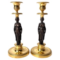 Excellente paire de chandeliers dorés avec cariatides. L'Empire français, vers 1820