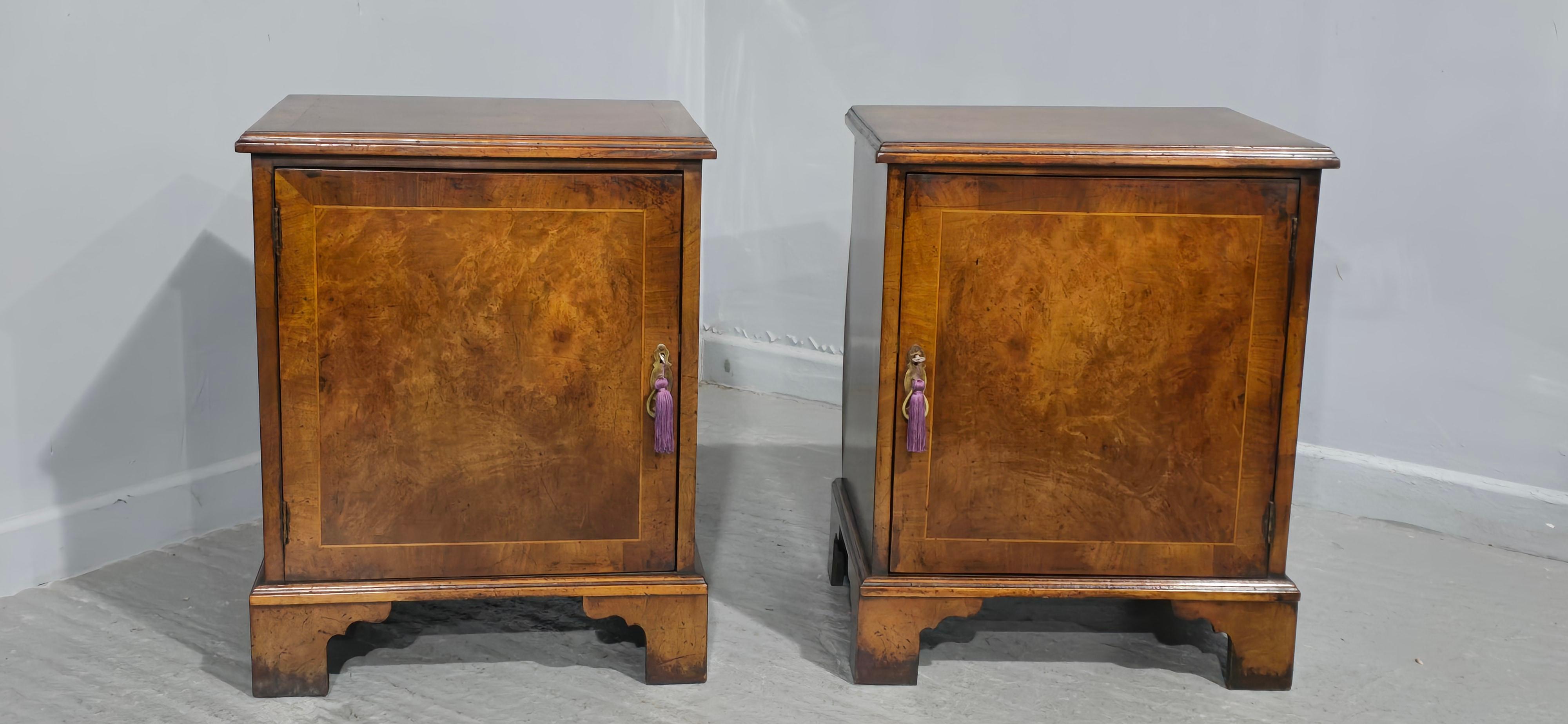 A very nice pair of single door burr walnut bedside lamp cabinets, standing on bracket feet, in overall excellent colour and condition

26