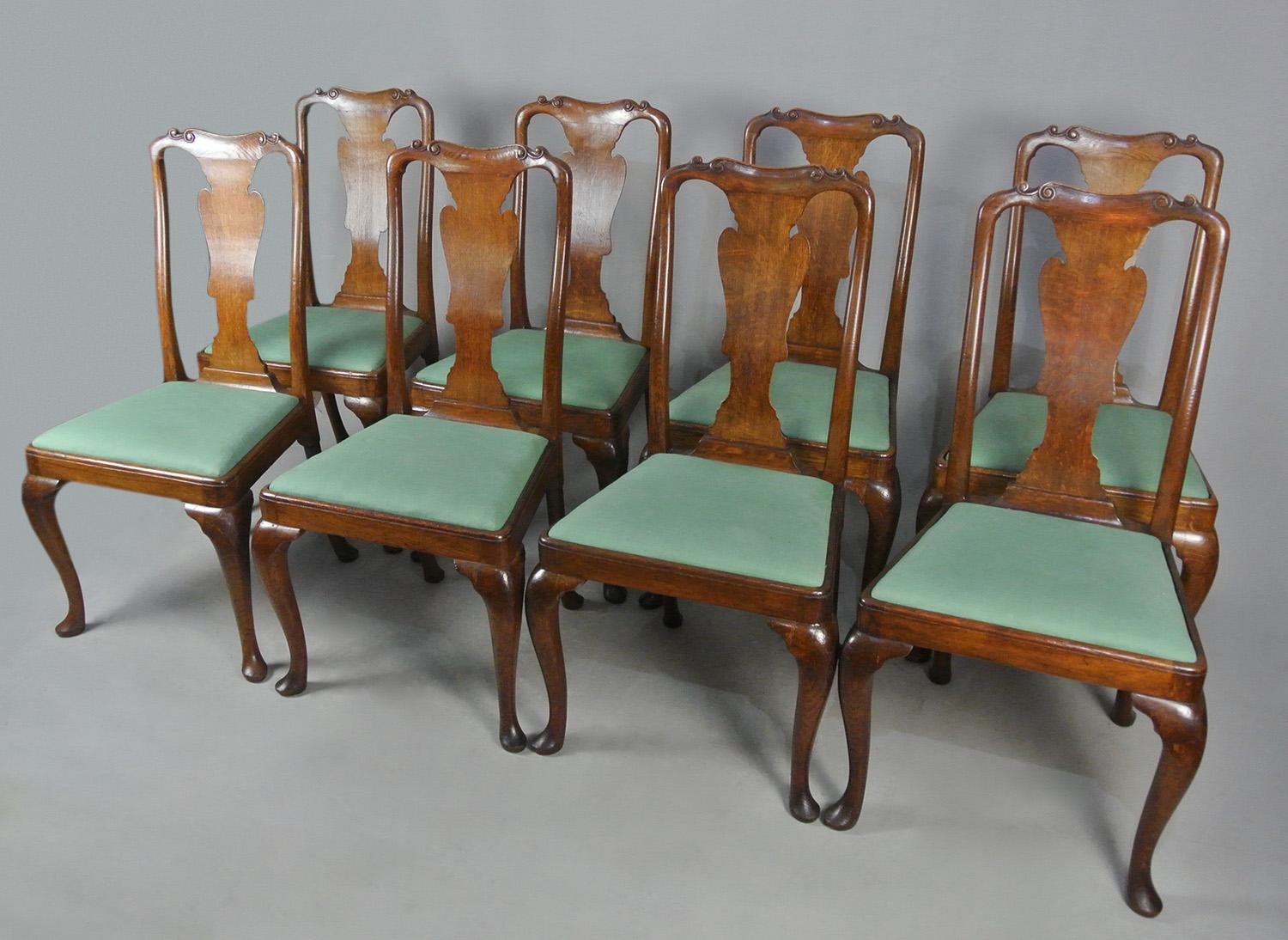 A beautiful set of chairs in solid oak, heavy and very solid and robust without weakness in the joints or repairs.  These date from c. 1900 but were made in the style of a set of chairs of 1720 with long cabriole legs, shapely curved back splats and