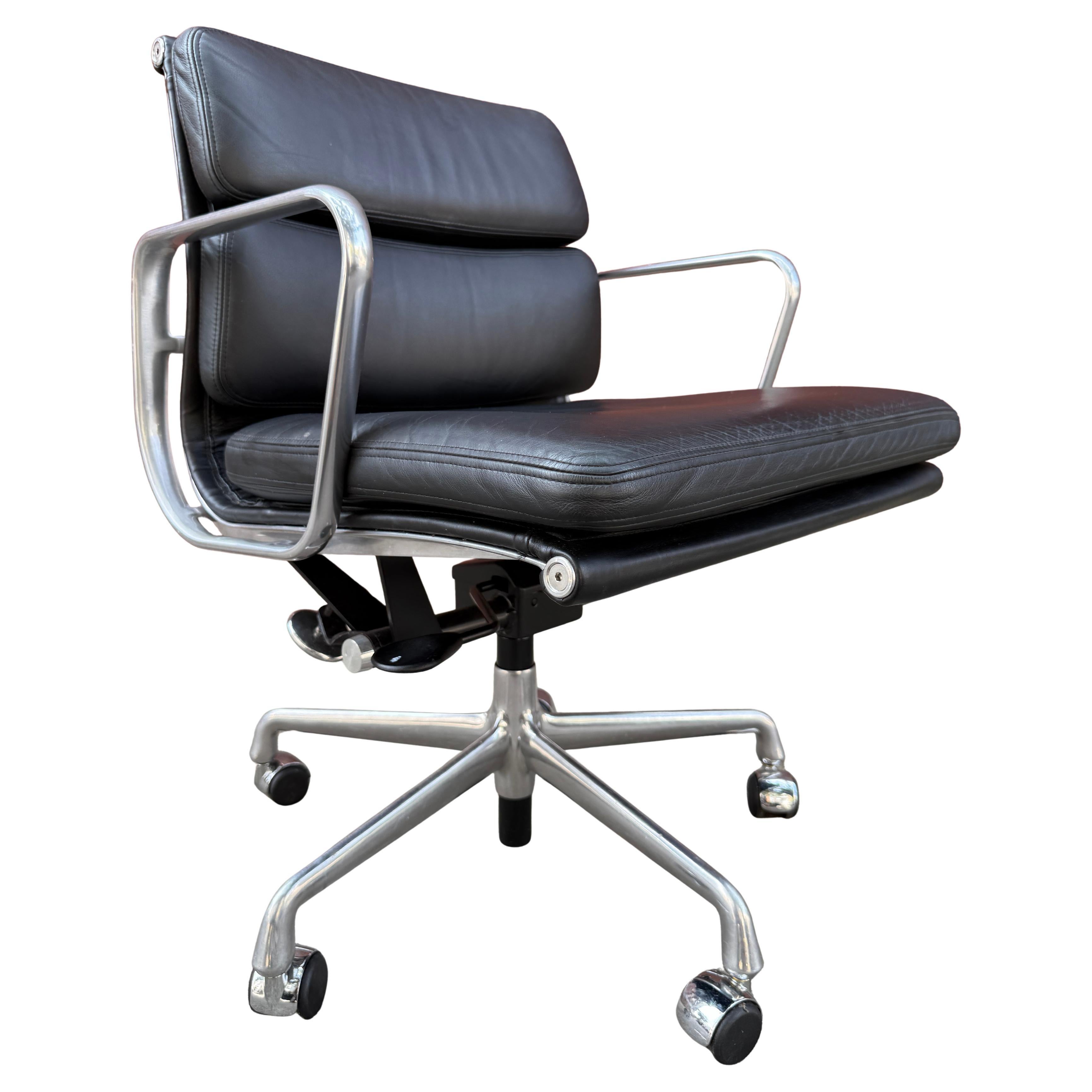 For your consideration is this authentic Eames for Herman Miller vintage soft pad chairs in black leather. Adjustable tilt and height with pneumatic lift. This authentic vintage example are icons of Mid-Century Modern design. This chair is part of