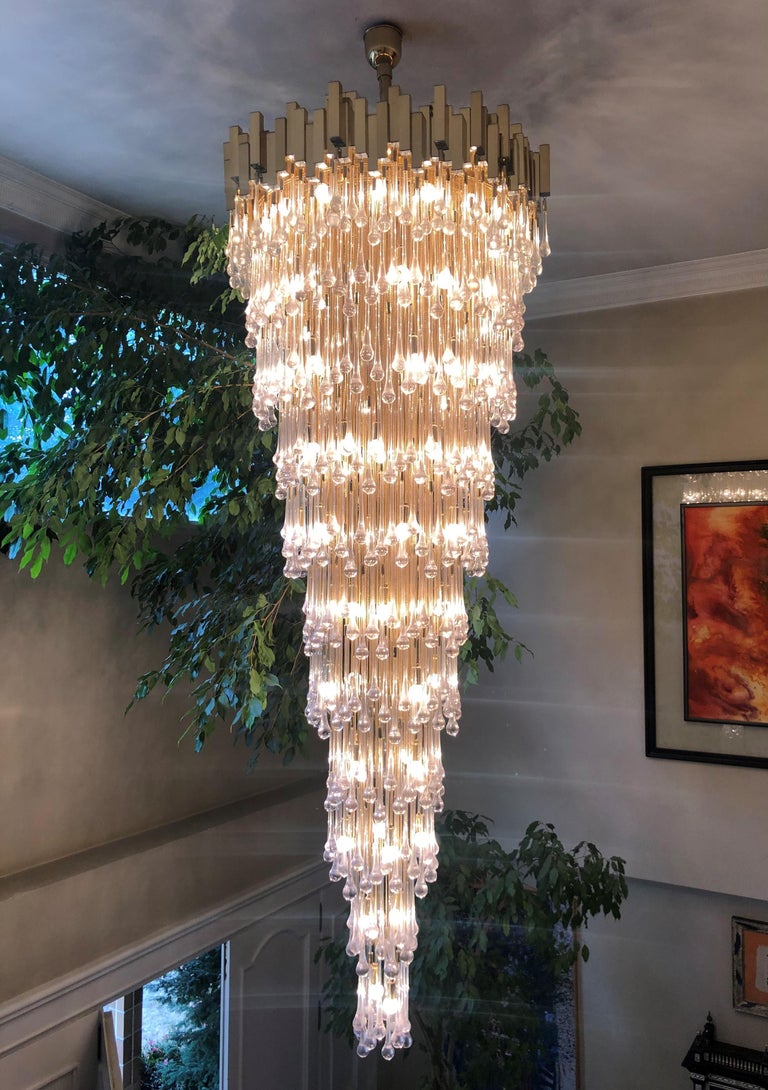 Marvelous, unique and exceptional large Midcentury Spanish chandelier, crafted during the 1970s by BD Lumica, Barcelona.
BD Lumica was a prestigious Spanish company, based in Barcelona, producing high quality and design lighting.
This Chandelier