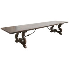 Exceptional 13.5-Foot Walnut Italian Baroque Style Trestle Dining Table