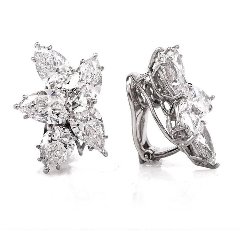 These stunning pair of earrings circa 1990'S, set with 10 pear shape diamonds in solid platinum hand crafted mountings. All diamonds are individually inspected and certified by GIA. Total diamond weight is 14.64 carats. Diamond weight ranges from