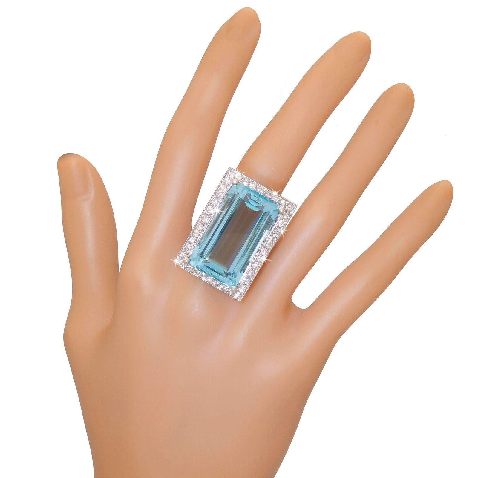 Showcasing a fabulous fine quality natural Aquamarine weighing an astonishing 31.63 ct's surrounded by a total of 40 Brilliant Cut Diamonds weighing approx. 1.25ct's. (G VS2-SI1);
The stunning color of Carribean blue is just mesmerising the moment