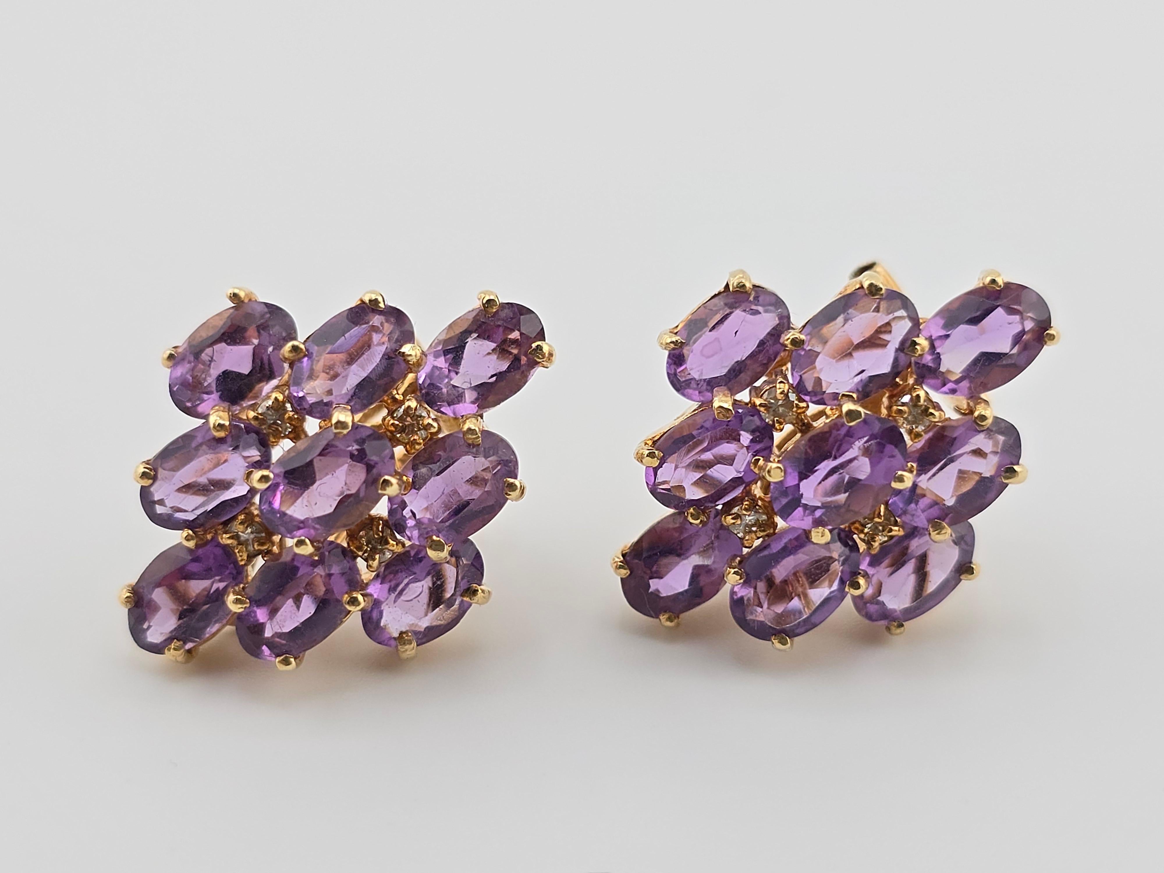This is a gorgeous pair of amethyst and 14 karat yellow gold earrings. The total weight of the amethyst is approximately 4 carats each earring. The condition is very good and it is ready to go. They are truly well-made fantastically. There is also