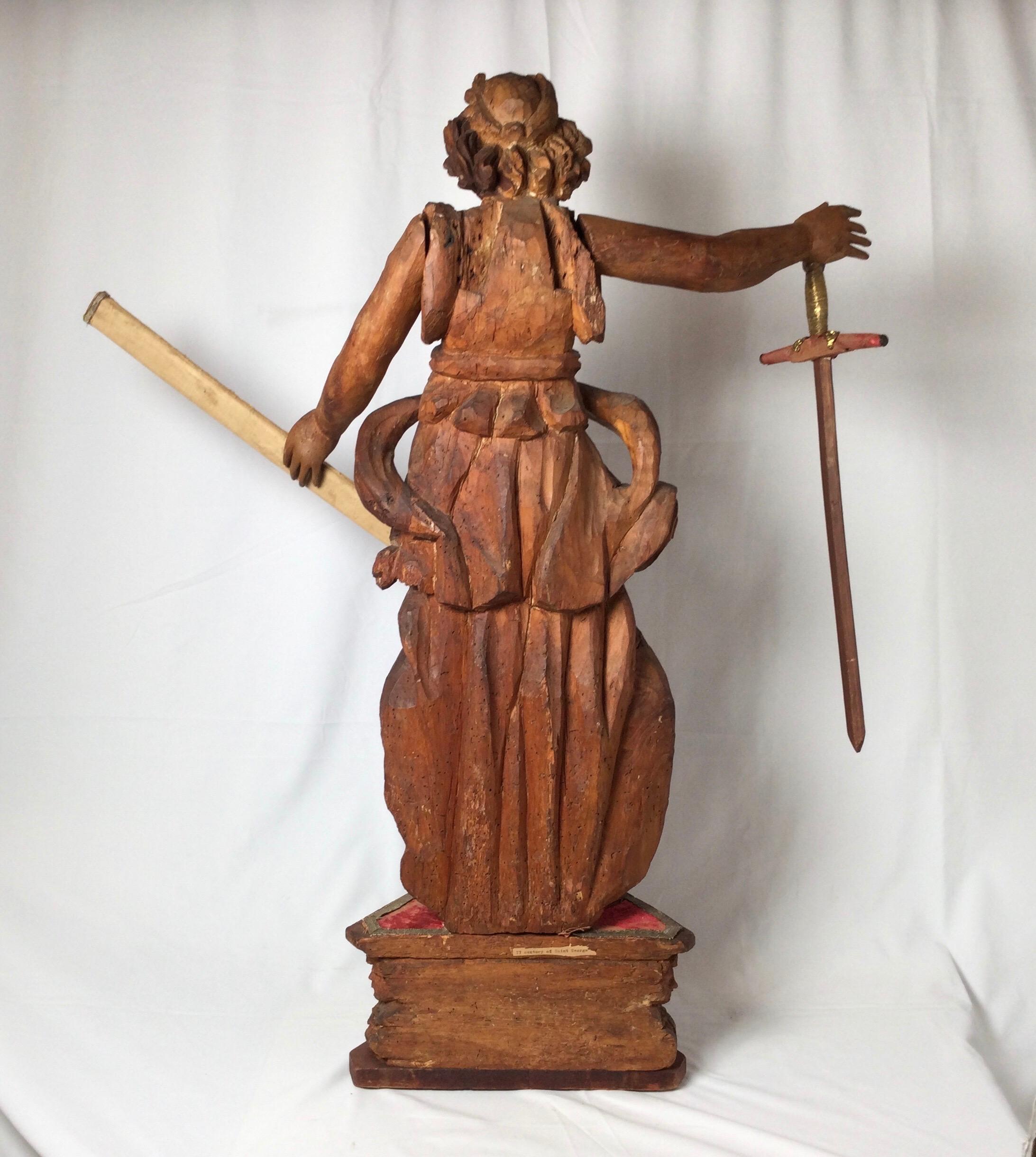 Exceptional 17th Century Carved Wooden Statue of Saint Micheal For Sale 4