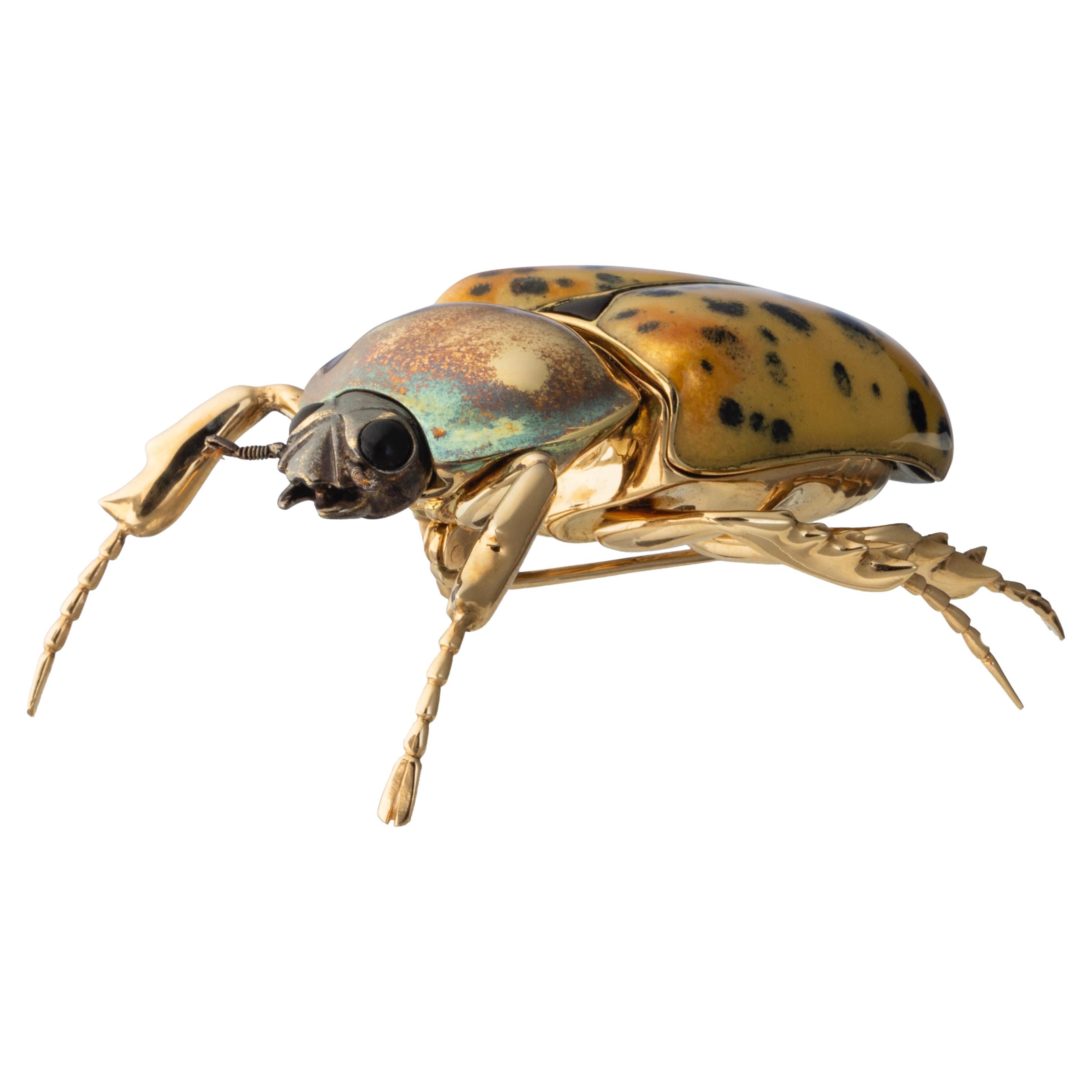 Exclusive And Iconic Scarab Brooch in 18 Karat Rose Gold, Enamel and Ebony Wood