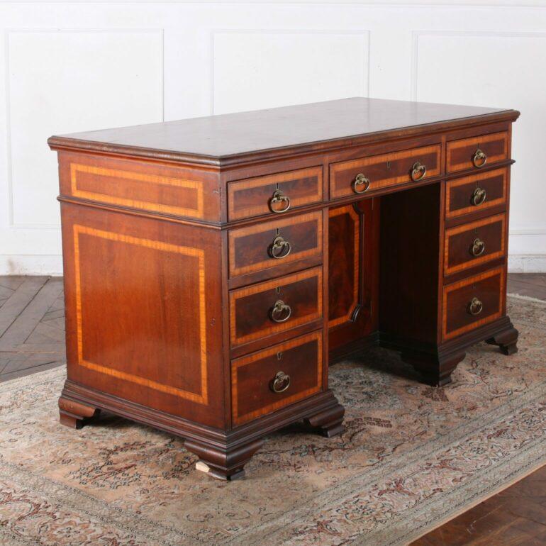 For the collector of fine antiques we are proud to present our newest acquisition by T.Wilson of 68 Queen Street, London. (clearly stamped on the drawer) This gorgeous mahogany piece has crossbanding and original pulls. Rare. Period Regency.