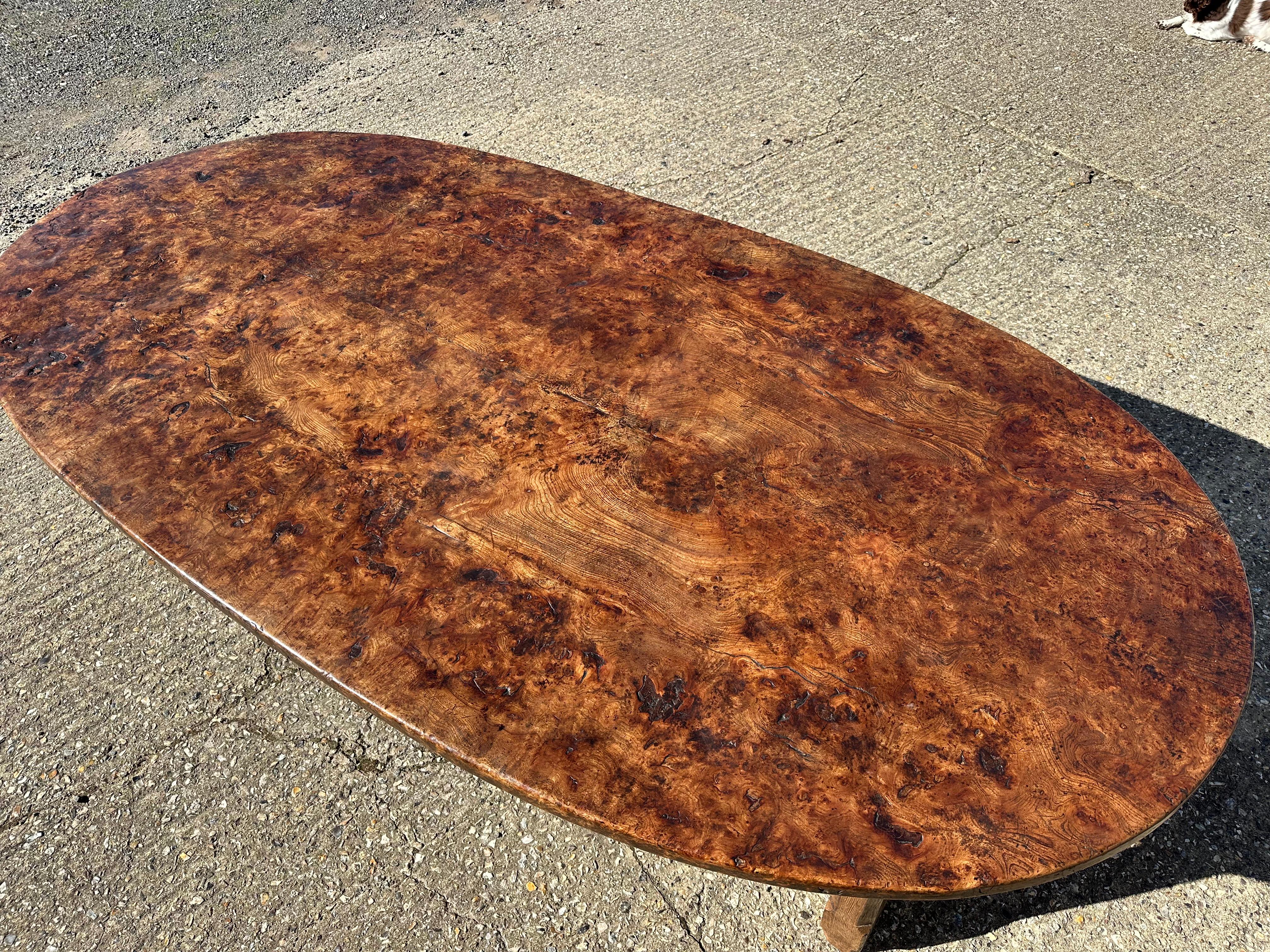A truly stunning 18th century burr elm and oak oval table - one of the best we've ever had in stock. The richly figured burr elm top has a deep, glowing patina and wonderful natural movement that only centuries of age can create. This rare table