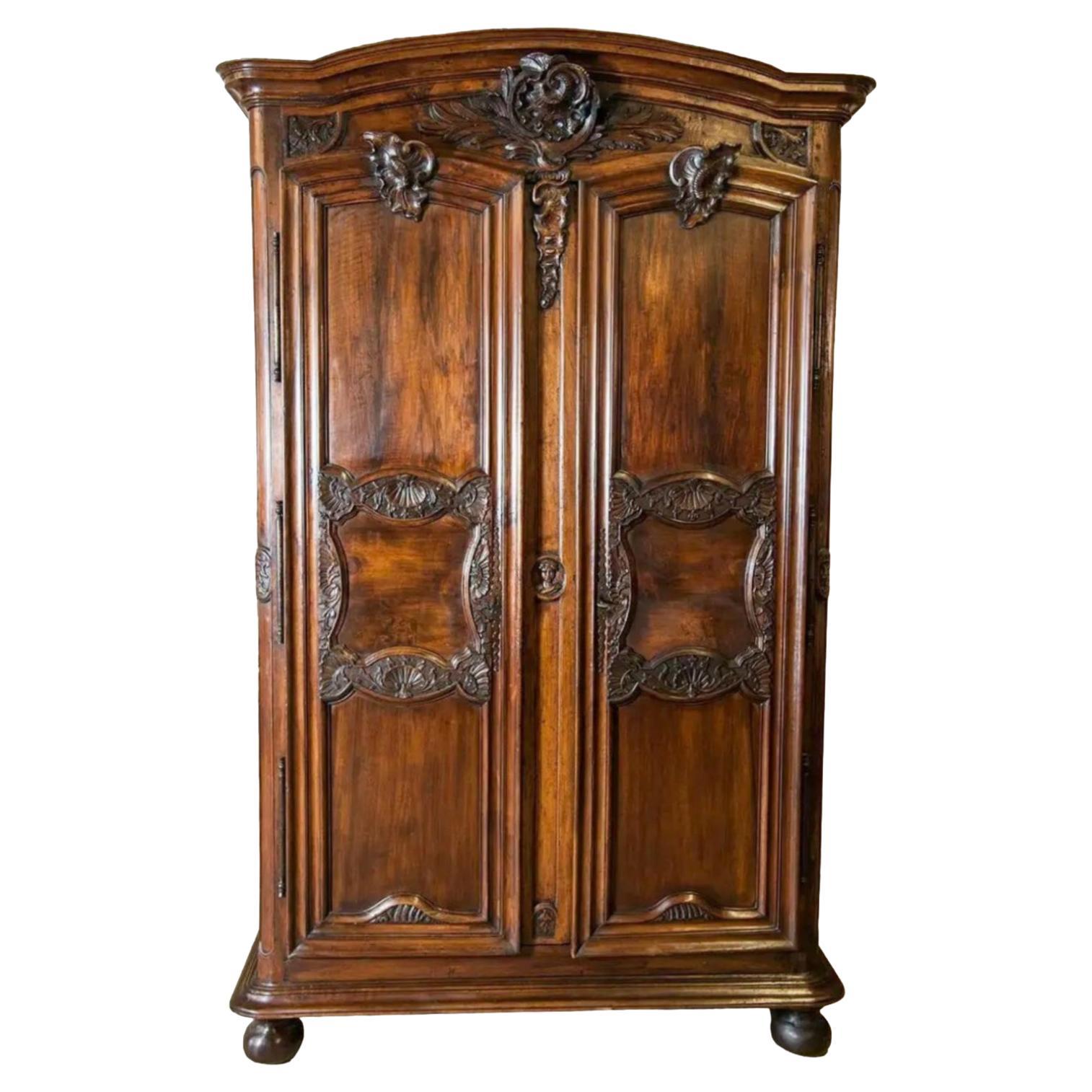 Exceptional 18th Century French Régence Period Walnut Chateau Lyonnaise Armoire For Sale
