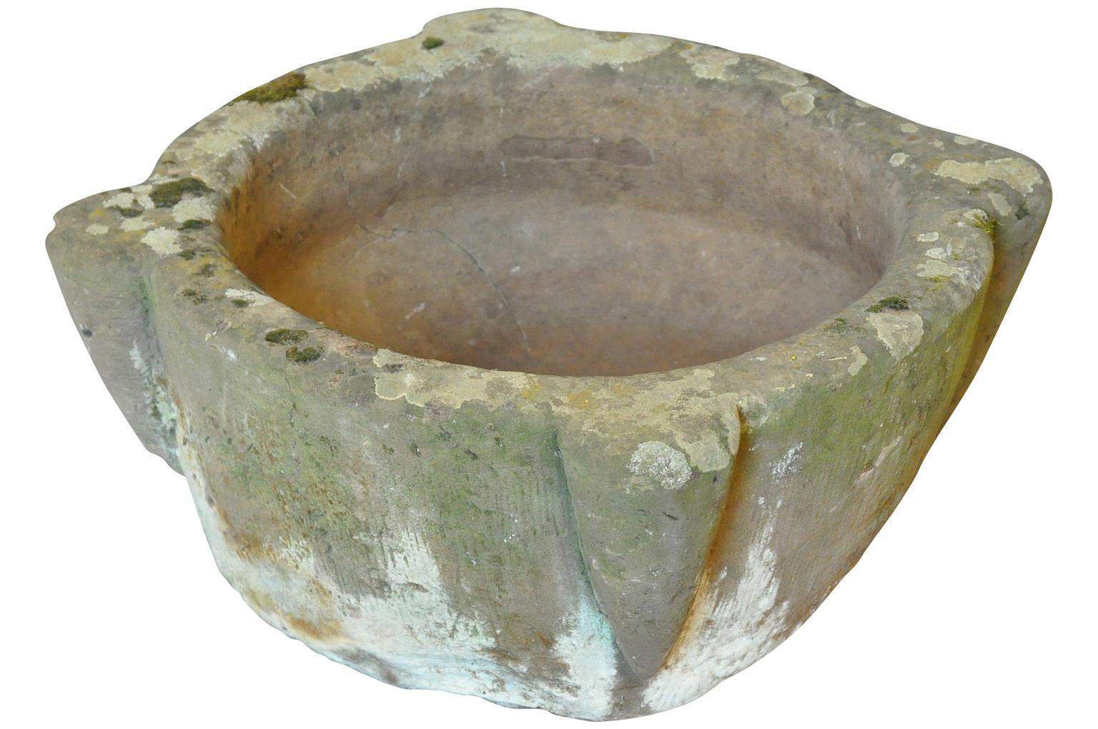 An exceptional 18th century stone Baptismal font from the South of France. Beautifully hand-sculpted with a sensational patina. Perfect as a water feature or vessel for any garden or interior.