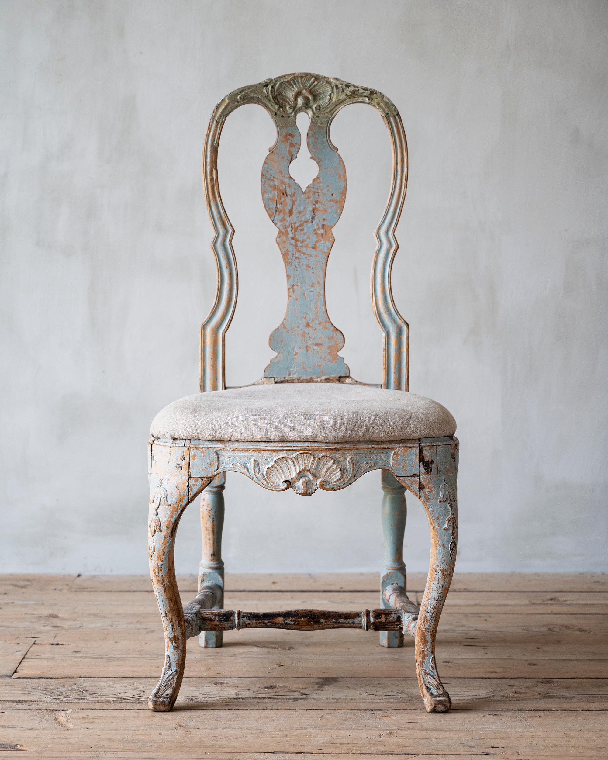 Exceptional 18th century Swedish Rococo chair with embossed carvings, original surface and great shape. ca 1770 Sweden. 