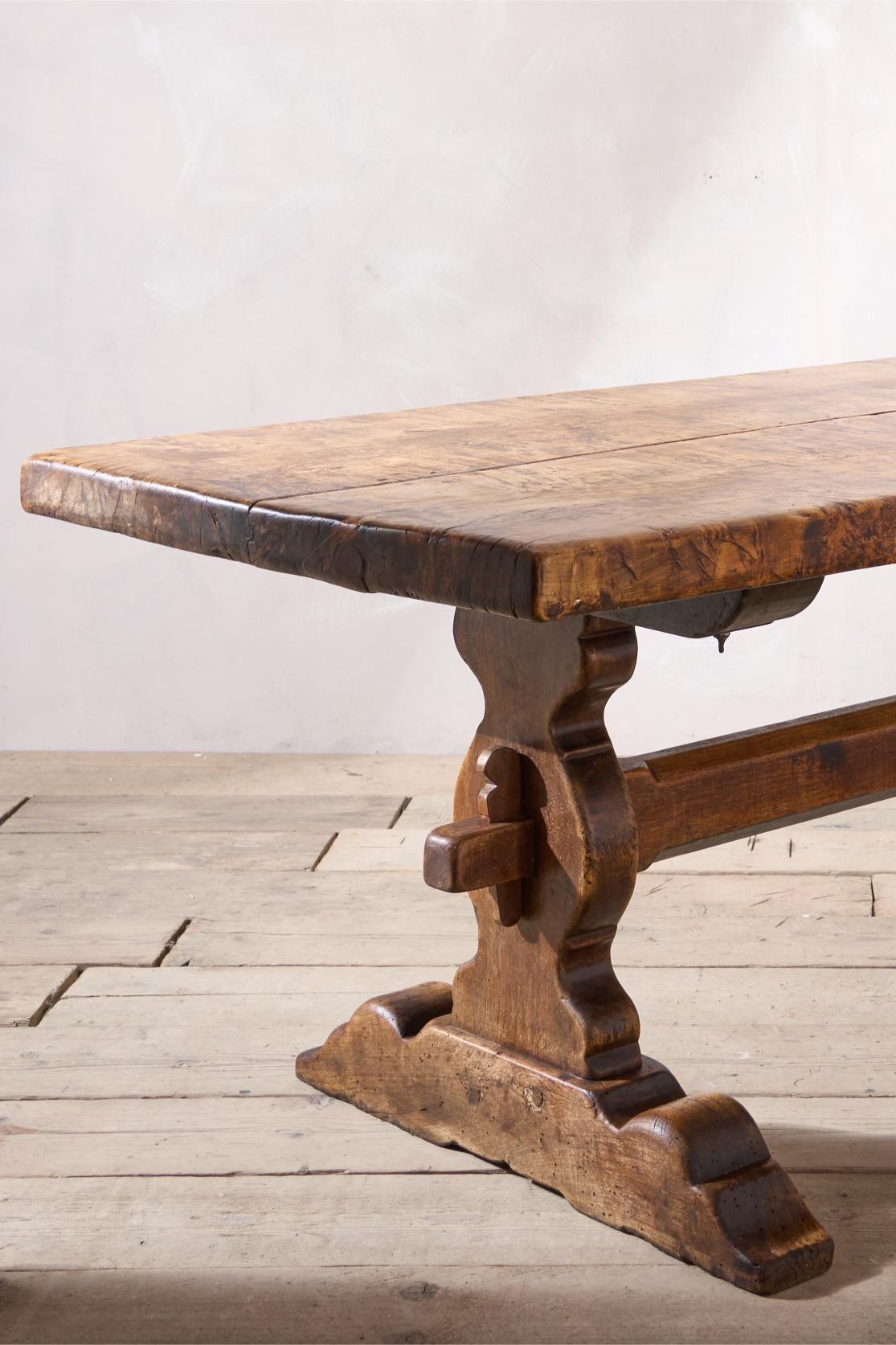 This is a spectacular late 18th century table made from solid walnut. The top is 2 plank and has the most amazing figuring throughout with elements of burr and strong grain. The planks are 3inch thick and have a stunning tactile feel to them from