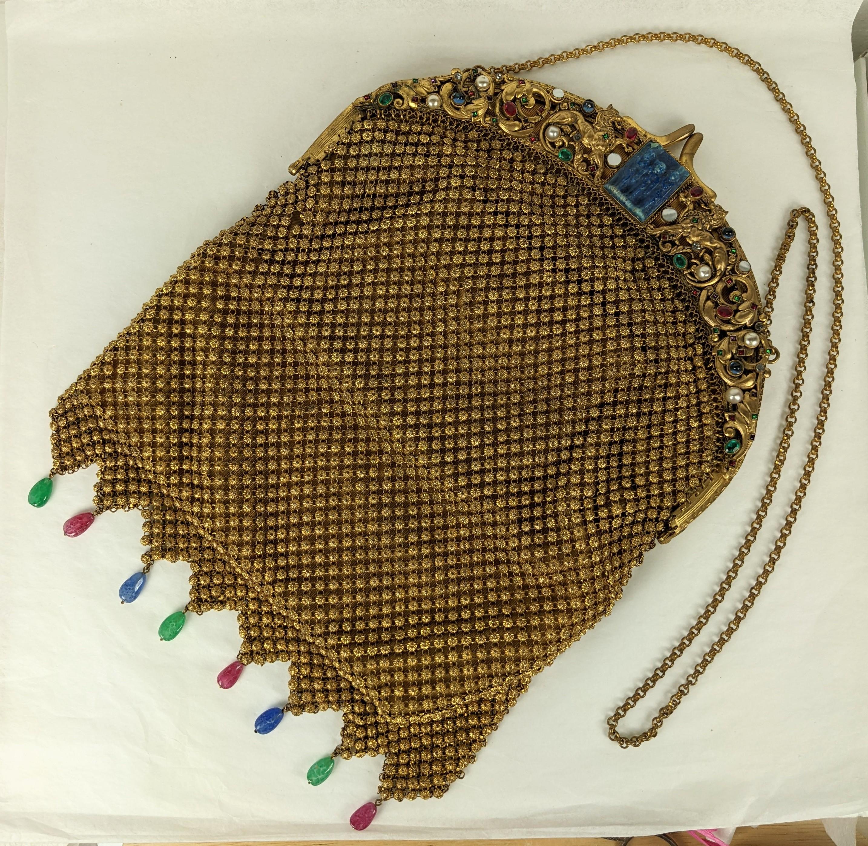 Wonderful, large 1920's Czech Jeweled Mesh Purse of the largest scale and finest quality relined by famed, Art Bag of Madison Ave. NY. Jeweled frame with faux lapis pate de verre molded cameo of Egyptian kings with large gilt lions, collet set