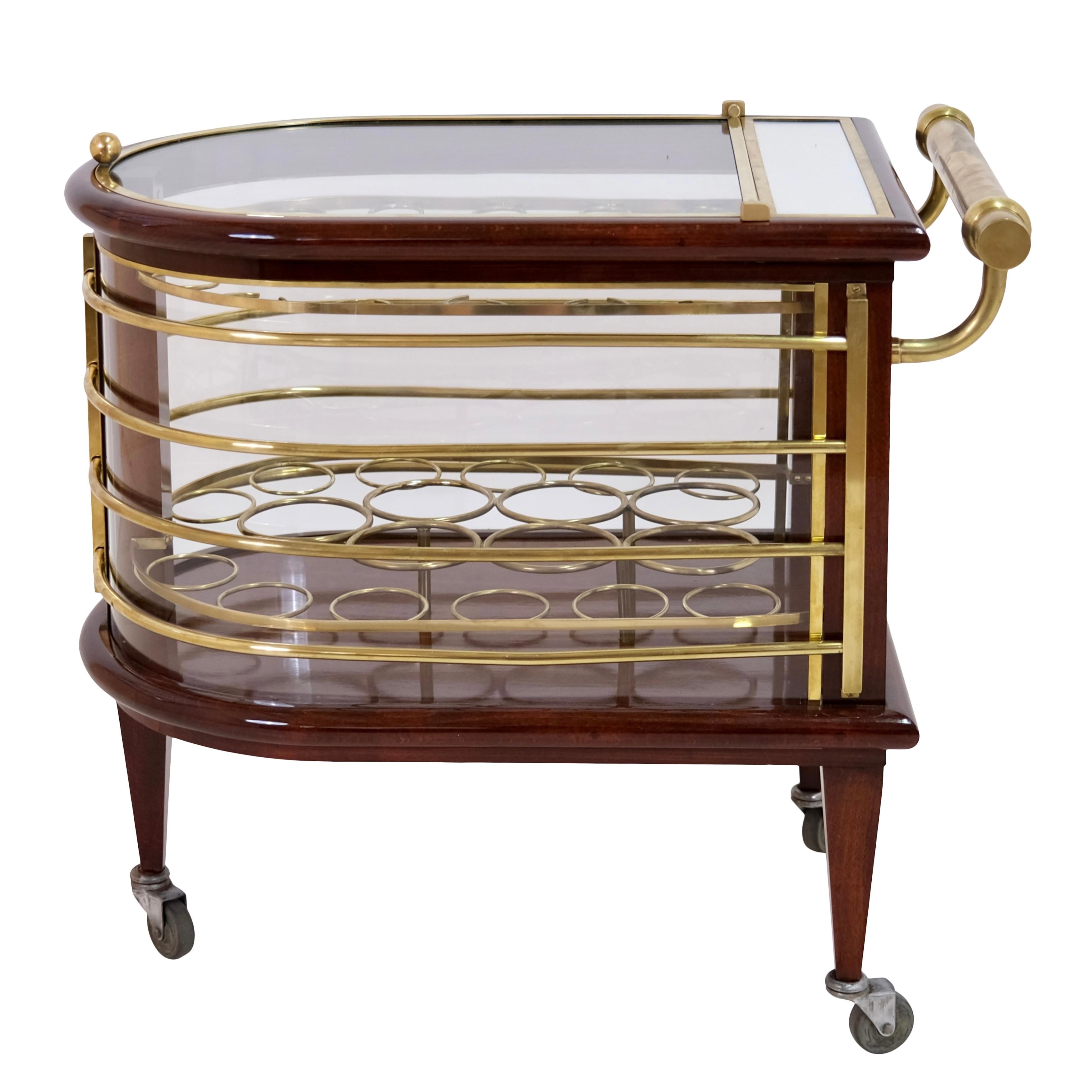 Luxury bar cart. 
Mahogany, shellac hand polished 
Brass and glass, cleaned 

Original Art Deco, France 1930s

Dimensions:
Width: 69 cm
height: 66 cm
Depth: 43 cm.