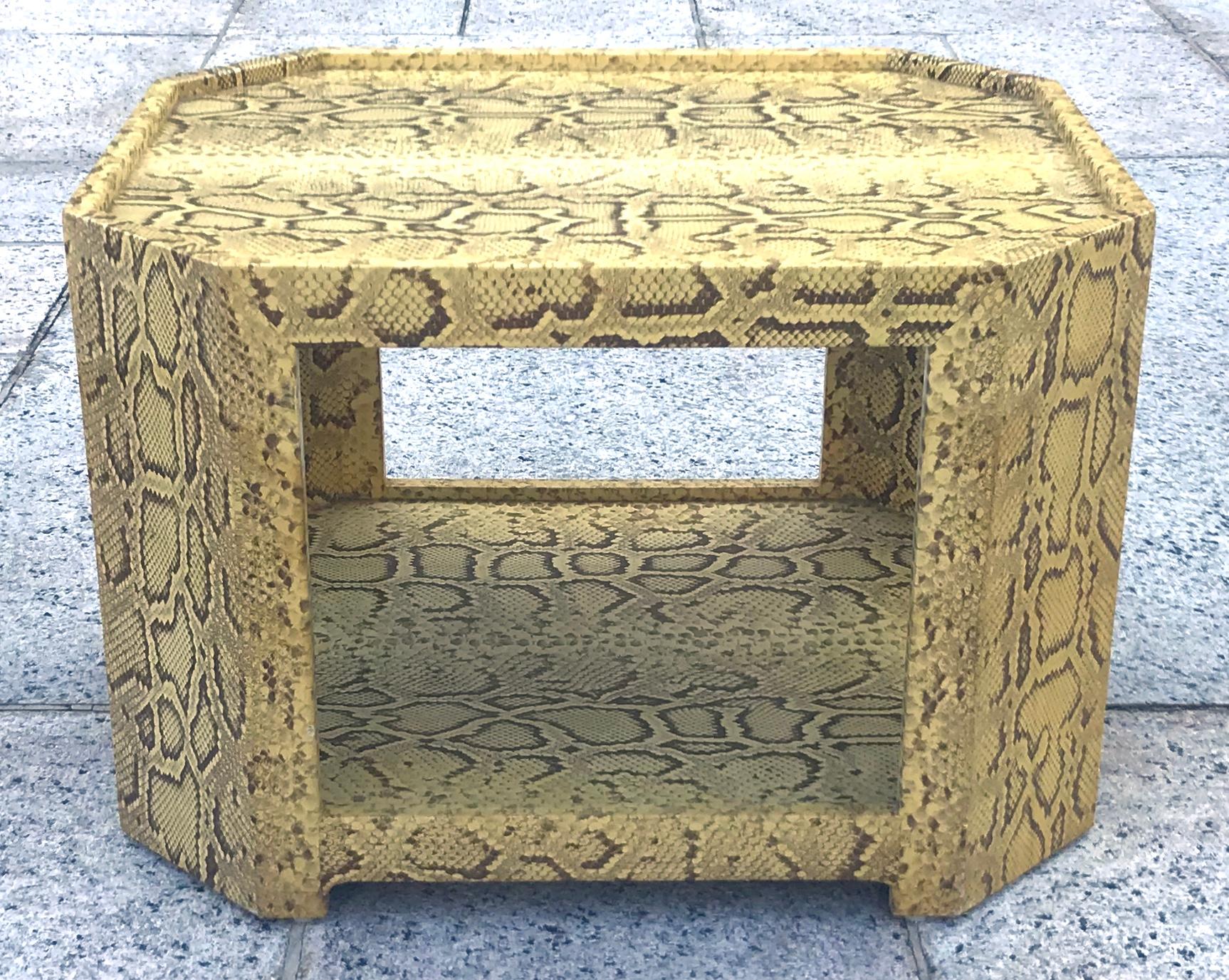 Exceptional and rare 1970s cocktail table or side table completely covered in natural python skin by noted master designer Karl Springer. The quality and craftsmanship are absolutely unparalleled on this piece, with the hides meticulously laid down