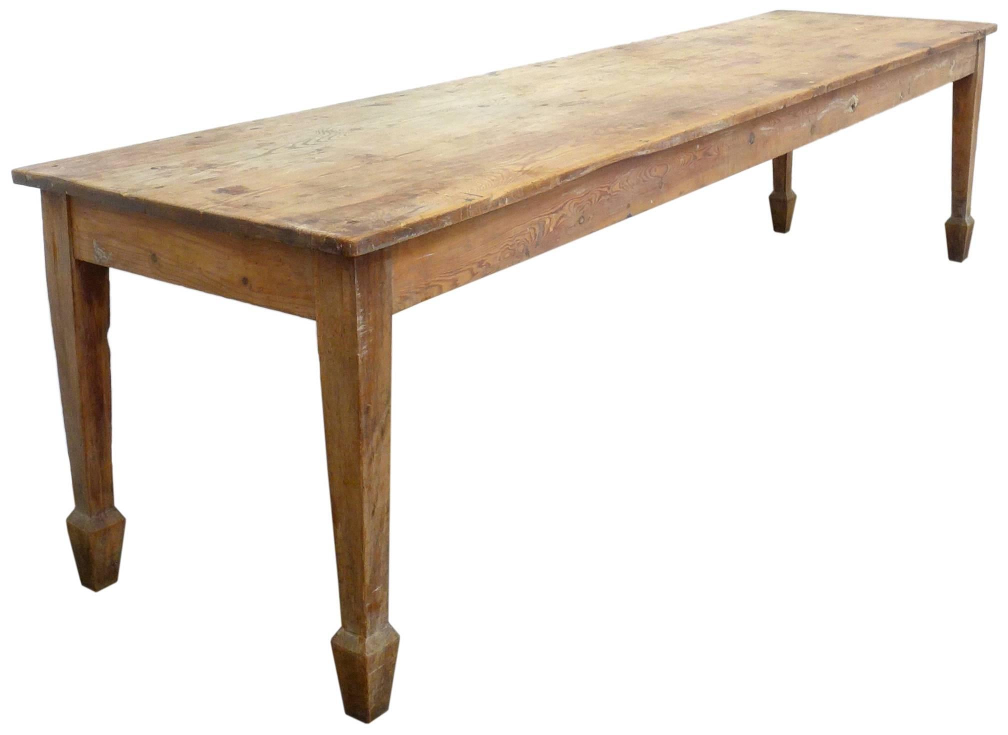 An extremely impressive and beautiful 19th century English farm table. Fantastic scale, form, patina and vibe; wonderful, carved and faceted leg details as well as dimensions that could easily accommodate ten dinner guests. An extremely elegant and