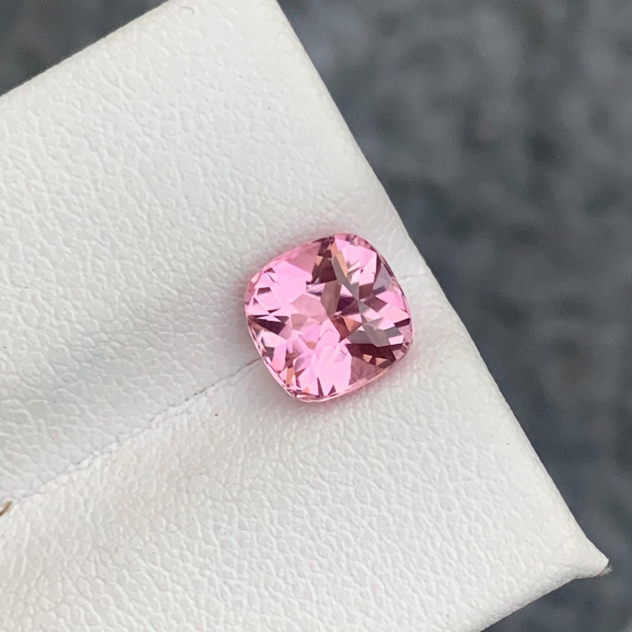 Faceted Tourmaline
Weight: 2.0 Carats
Dimension: 7.3x7.3x5.6 Mm
Origin: Kunar Afghanistan
Color: Pink
Shape: Cushion
Clarity: Eye Clean
Certificate: On Demand

With a rating between 7 and 7.5 on the Mohs scale of mineral hardness, tourmaline jewelry