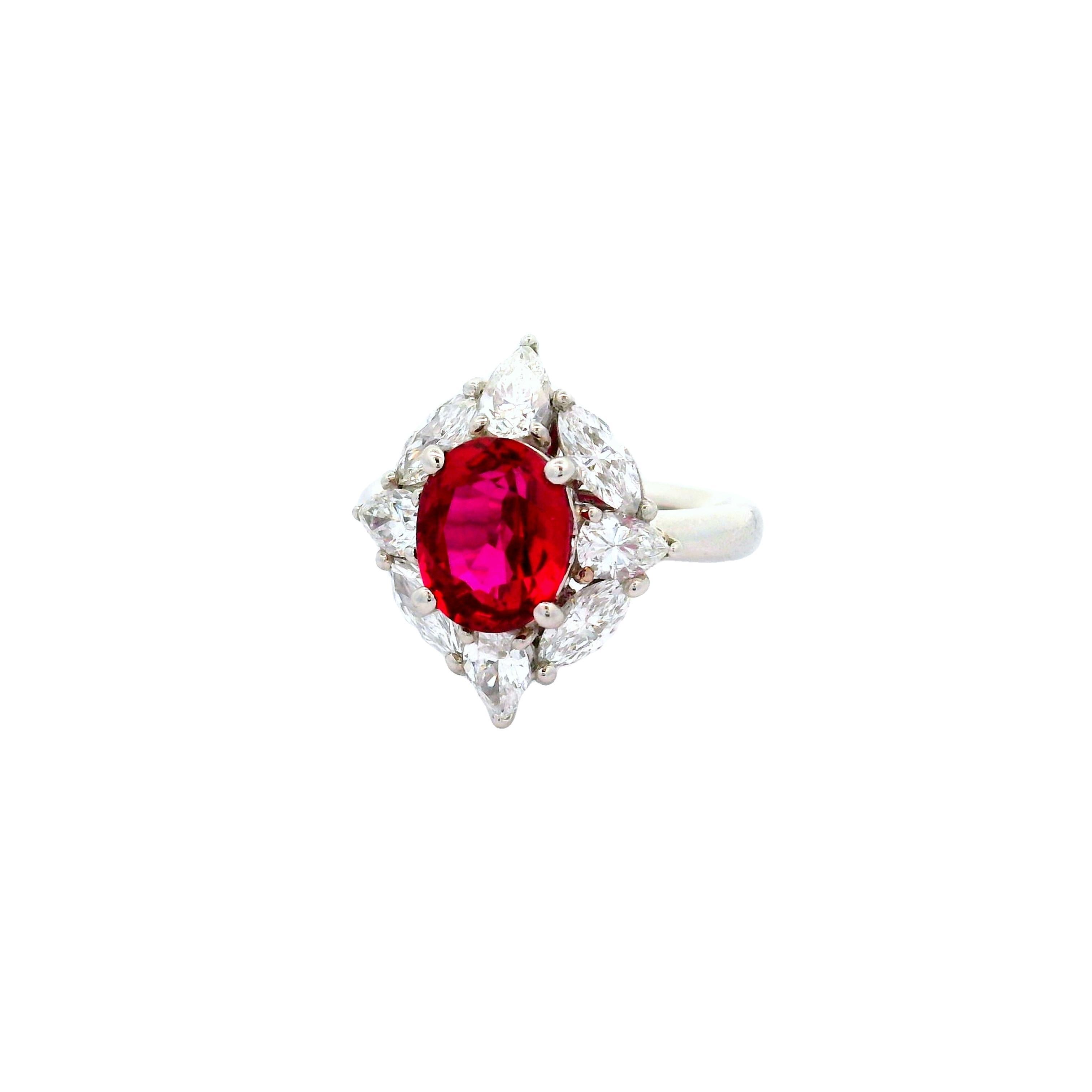 An exquisite ruby, weighing 2.25 carats, is the centerpiece of this contemporary ring. The oval-shaped ruby is of exceptional quality as it has a pure red vibrant and brilliant color. Additionally, the stone is completely clean, not one single