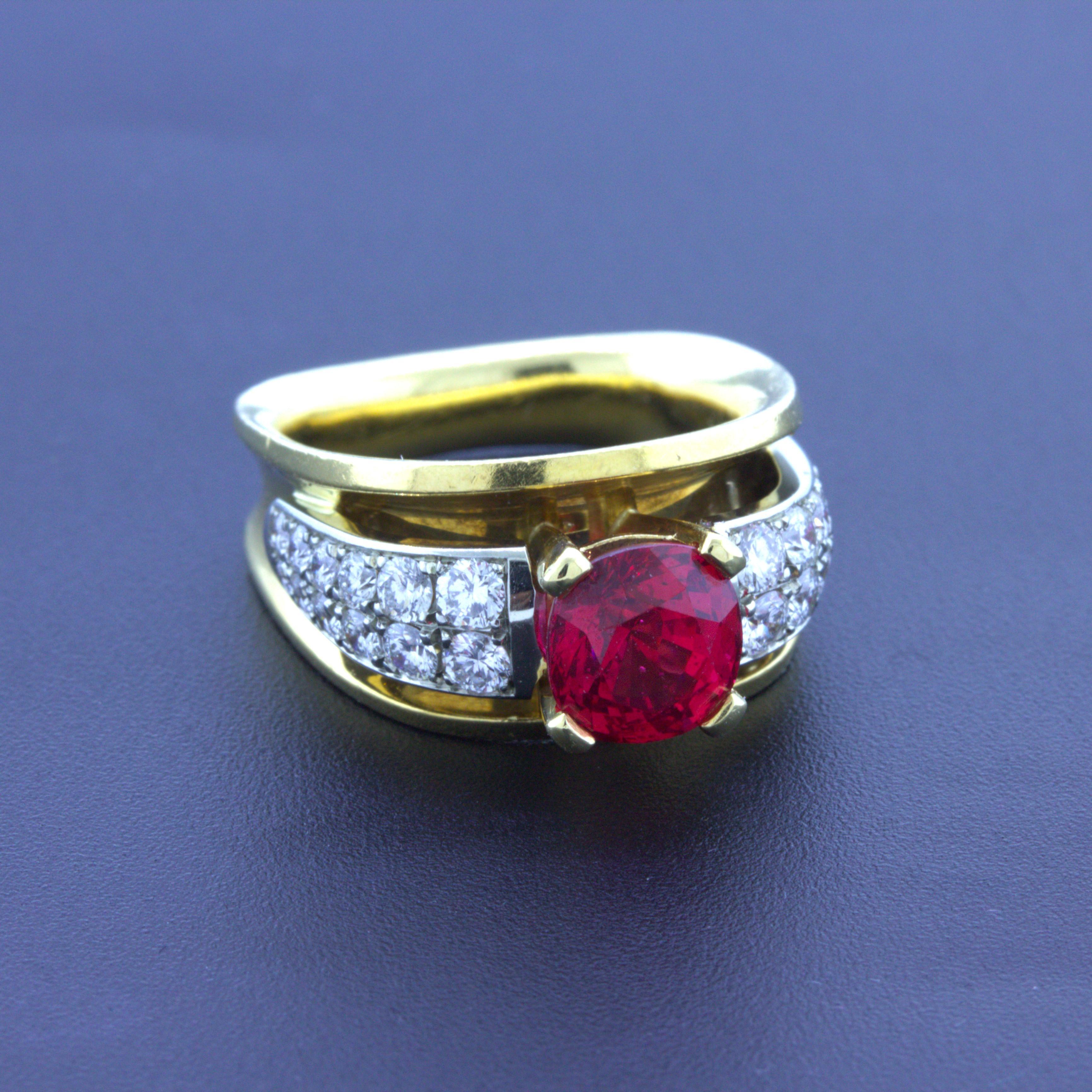 A lovely 18k yellow gold ring featuring an extra fine gem red spinel. It weighs 2.28 carats and has an intense and vibrant pure red color along with great brightness and life. It scintillates in the light, as fine spinel is known to do, and is very