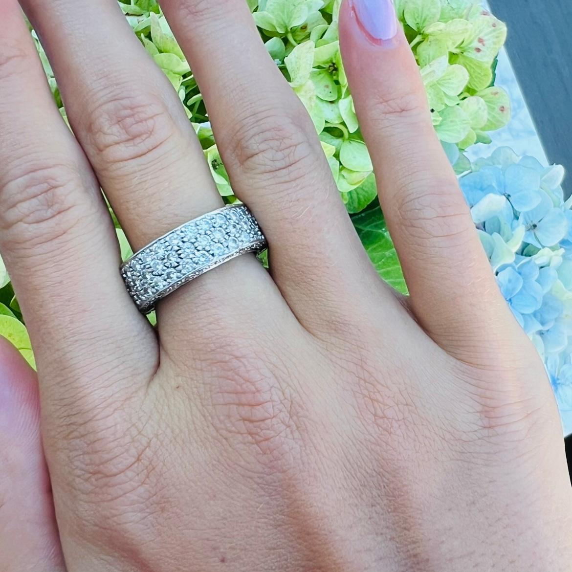 There are eternity bands, and then there is THIS eternity band! This platinum stunner features three rows of incredibly well matched natural diamonds along with diamonds along the inside edges of the ring weighing approximately 3.30 total carats.