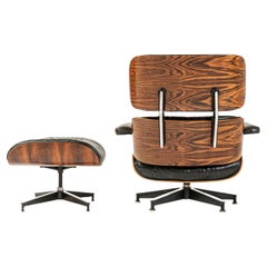 Exceptional 3rd Gen Eames Lounge Chair and Ottoman in Rosewood and Black Leather