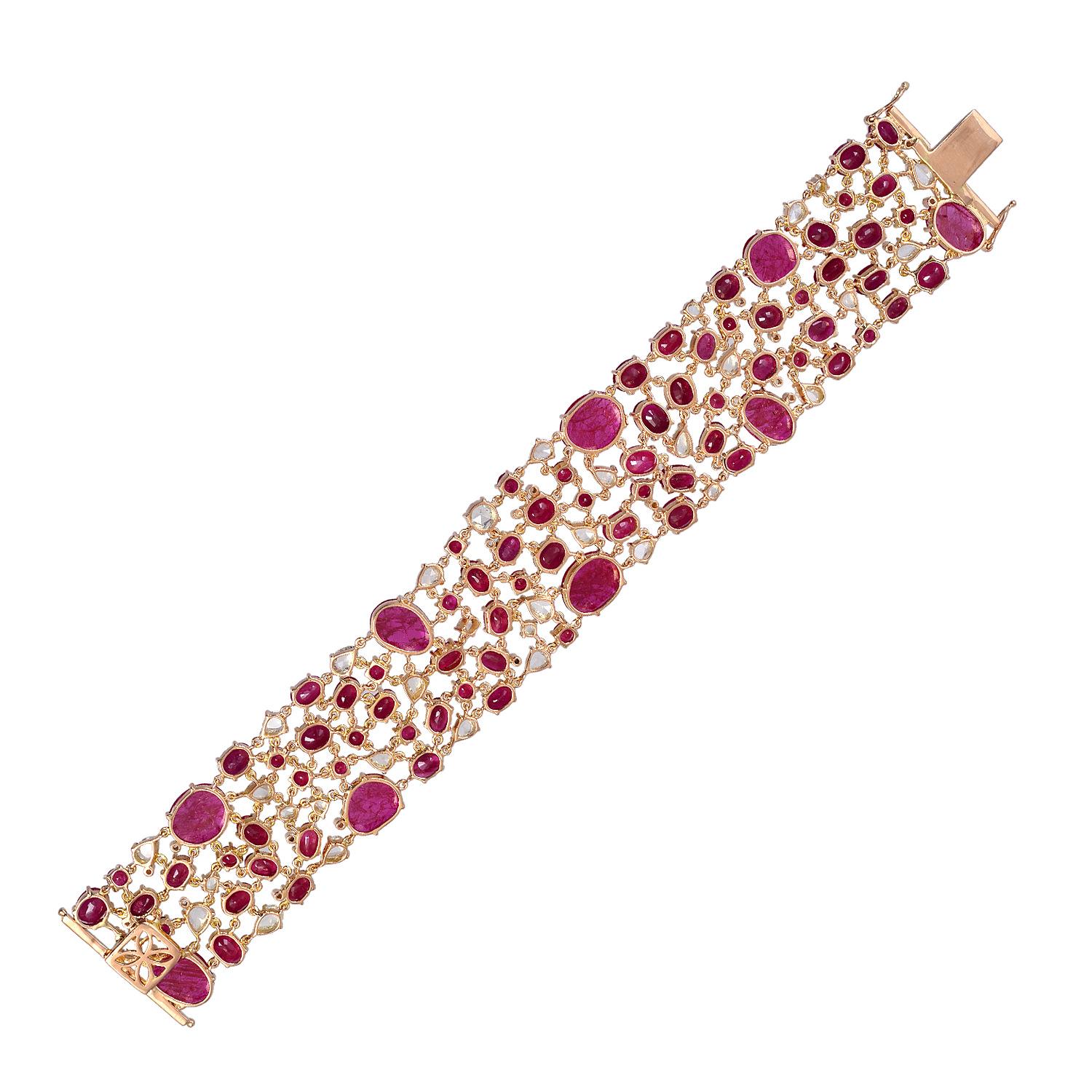 A stunning statement cuff handmade in 18K gold.  It is set in 52.82 carats ruby and 5.815 carats of sparkling diamonds. Clasp Closure

FOLLOW  MEGHNA JEWELS storefront to view the latest collection & exclusive pieces.  Meghna Jewels is proudly rated