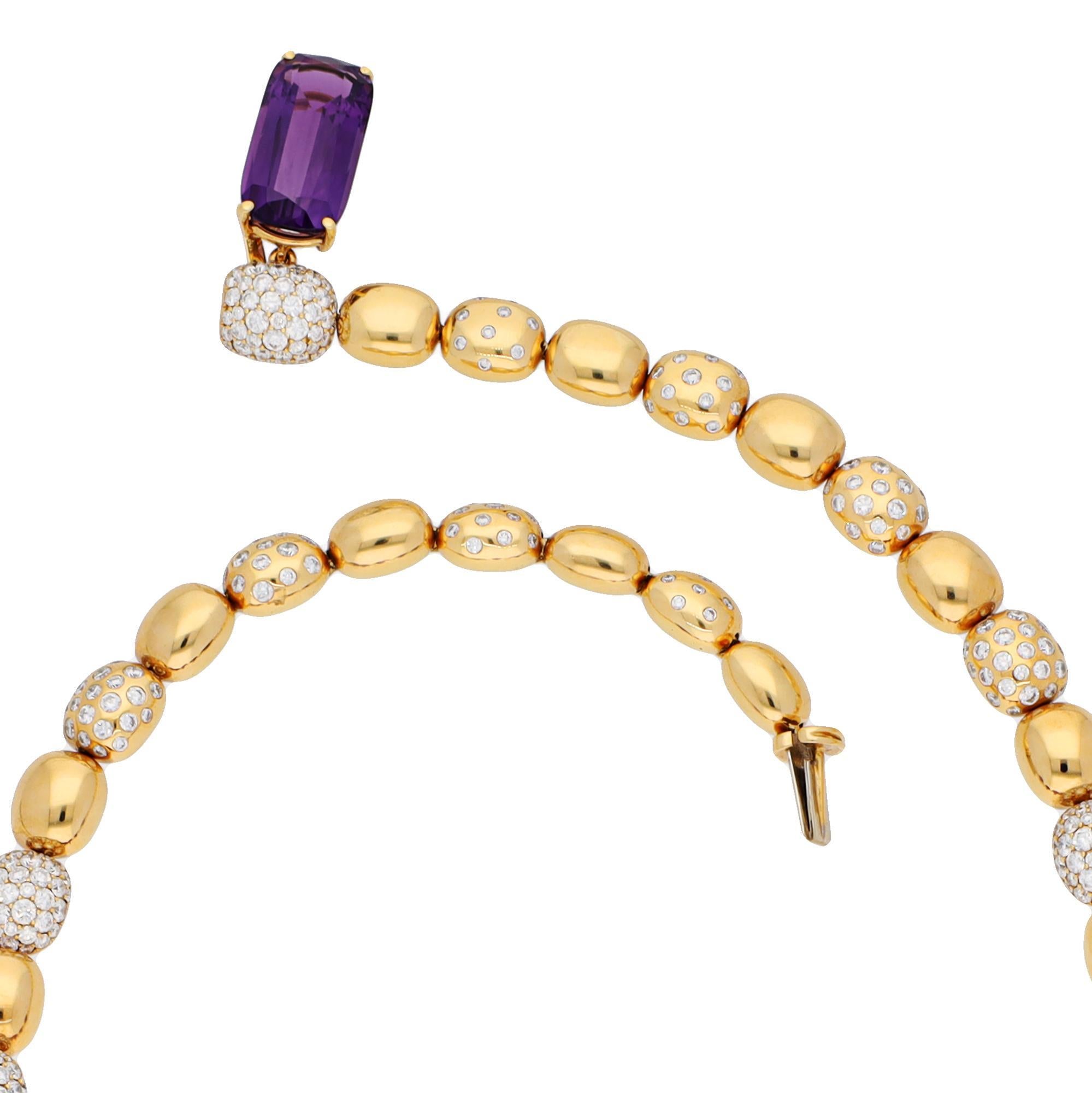 This exceptional necklace is a true masterpiece, featuring an exquisite combination of 600 carats of vibrant amethyst stones, each meticulously selected for its rich purple hue and flawless clarity. Surrounding these captivating gems are 12 carats