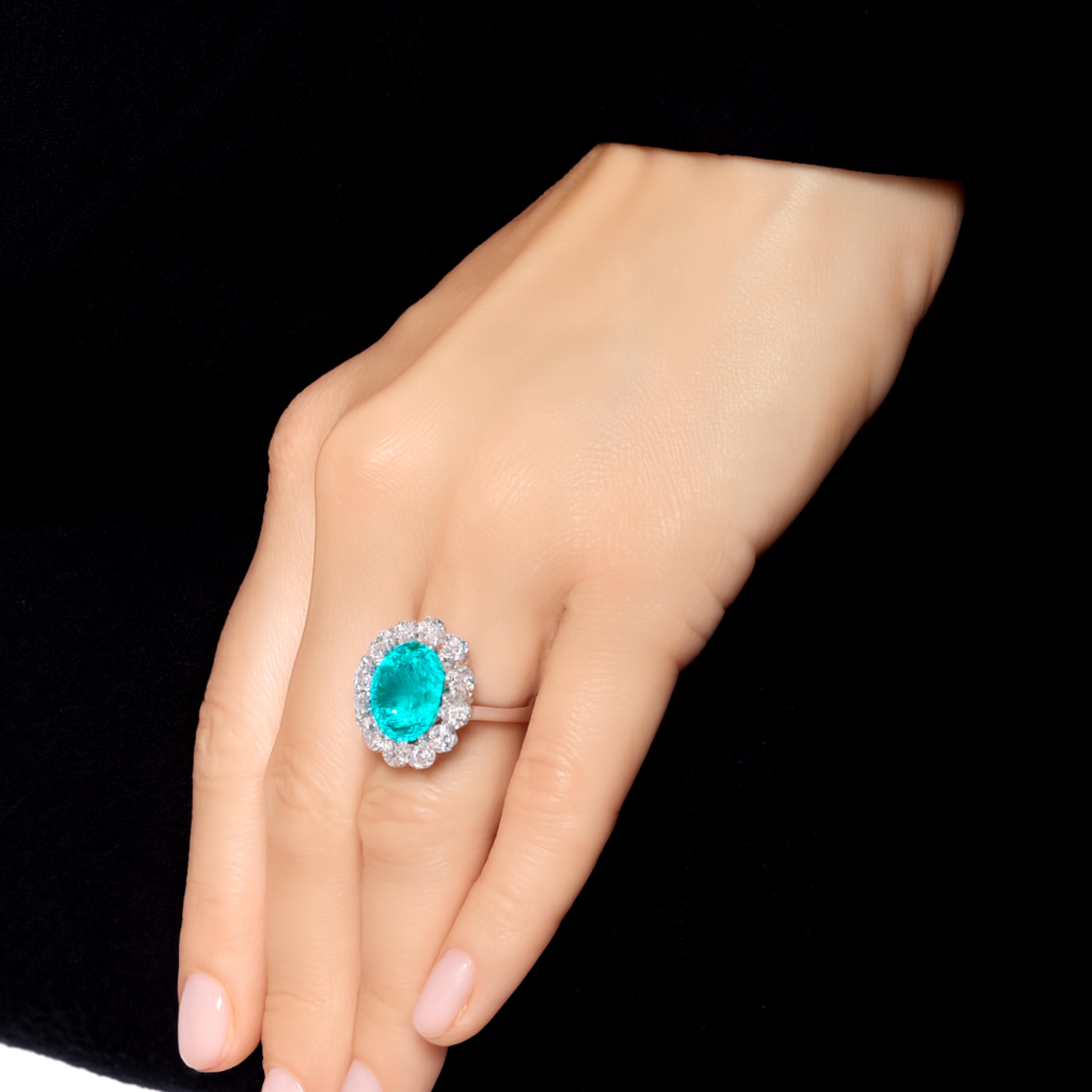 Oval Cut Exceptional 7 Carat Neon Paraiba Tourmaline Ring Certified by C. Dunaigre For Sale