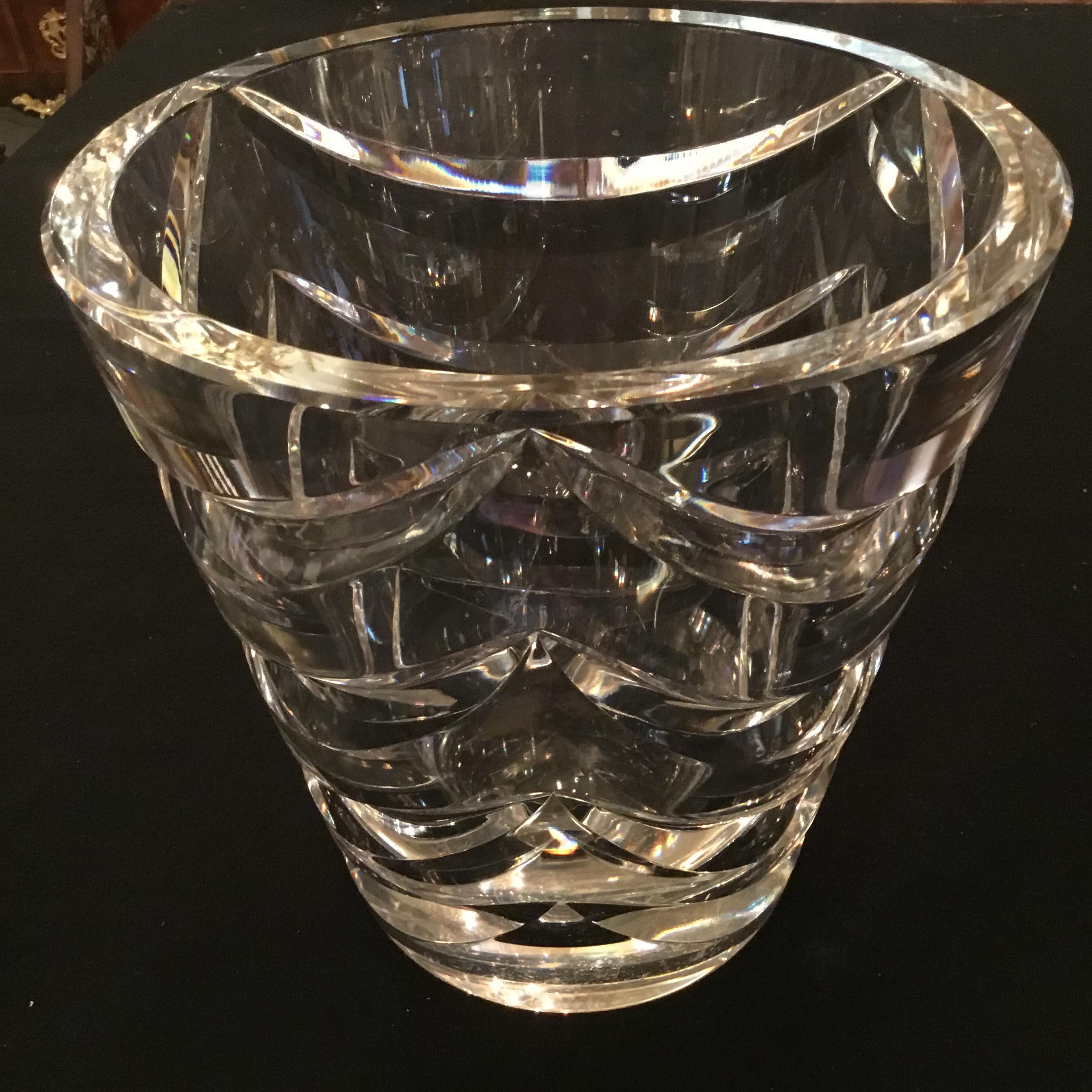 Very clear and brilliant crystal by renowned maker Val St. Lambert.
This piece is signed with an etched signature on the bottom of this
piece. The company was established in 1826 and is known for exceptional
quality in crystal.