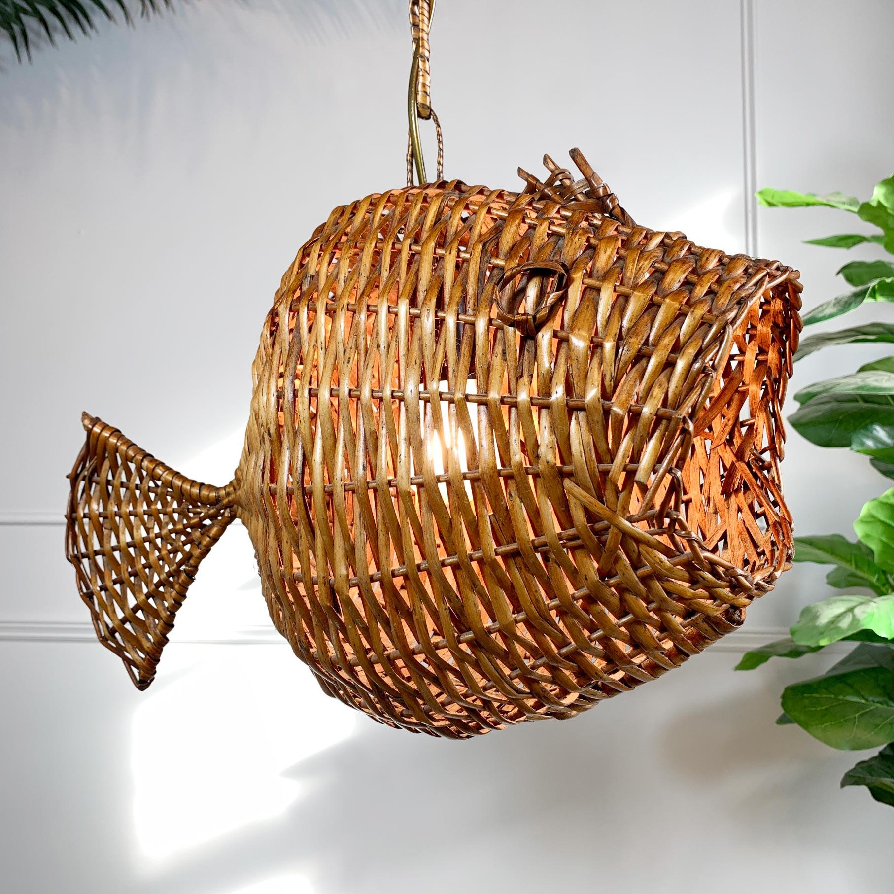 Superb 1950’s wicker fish ceiling light, French. Due to their nature these original ceiling lights are incredibly rare to find from this period and especially in such good condition.

The single e27 lamp holder sits inside the body of the Fish, the