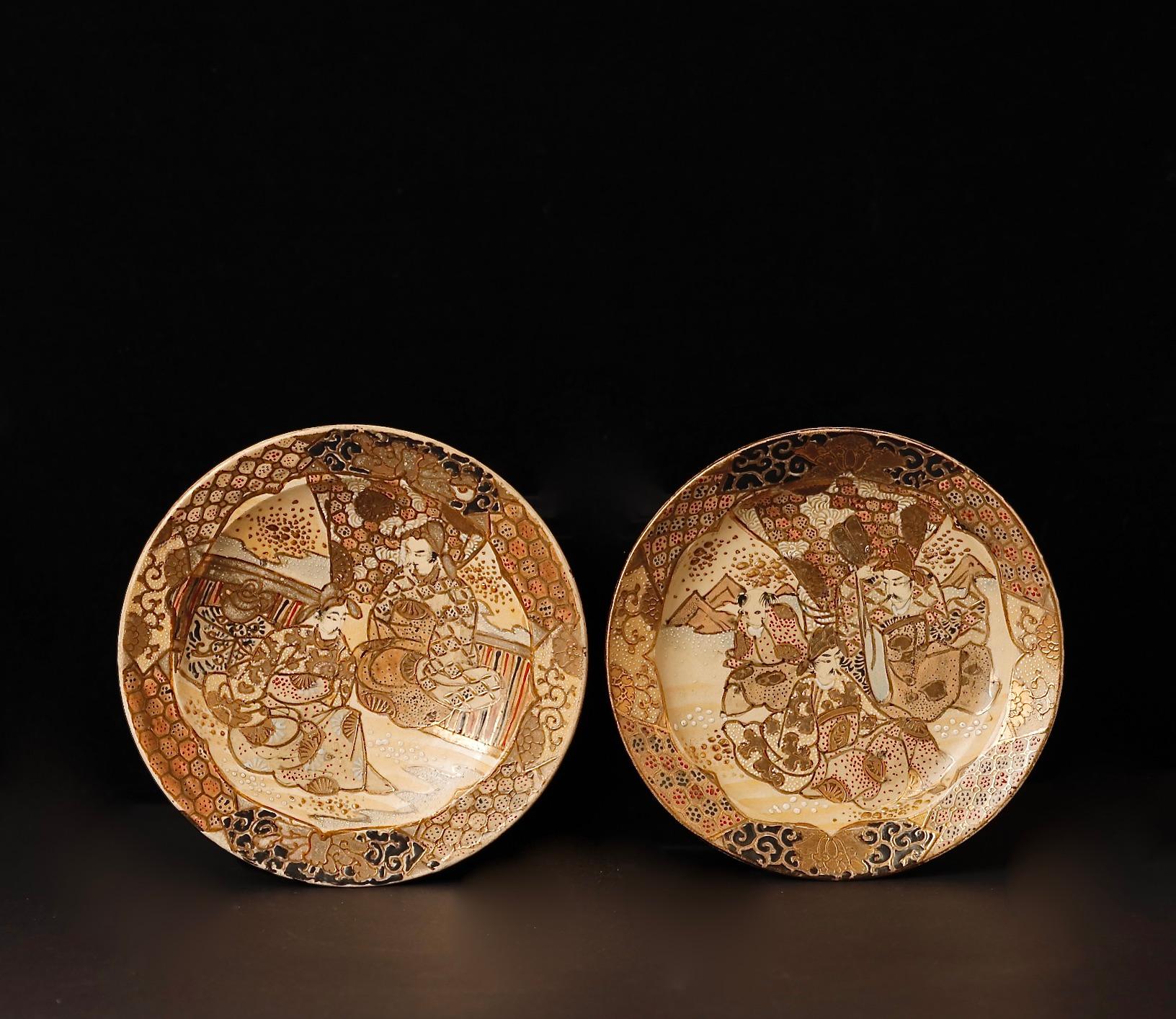 Beautiful Satsuma hand-painted porcelain plates set decorated with a motif of Nobles on a picnic. This exceptional set from the Meiji period (19th century) is a fine example of the intricate craftsmanship and attention to detail characteristic of