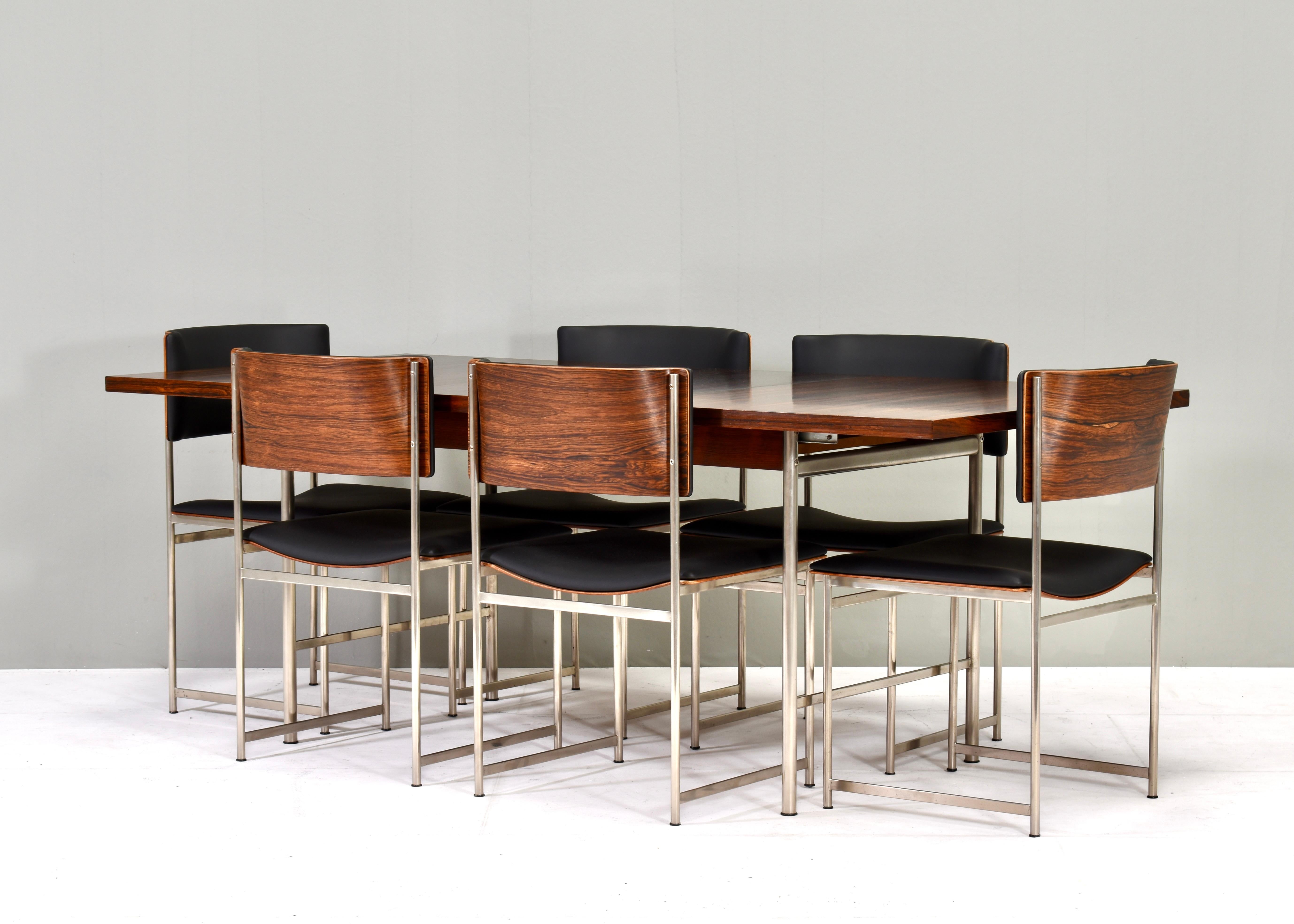 Gorgeous and rare model SM-08 dining set by Cees Braakman.
The backs and seats are made of molded venered wood.
The table top and plywood backs have been refinished. The chairs have been re-upholstered in beautiful high quality black faux leather,