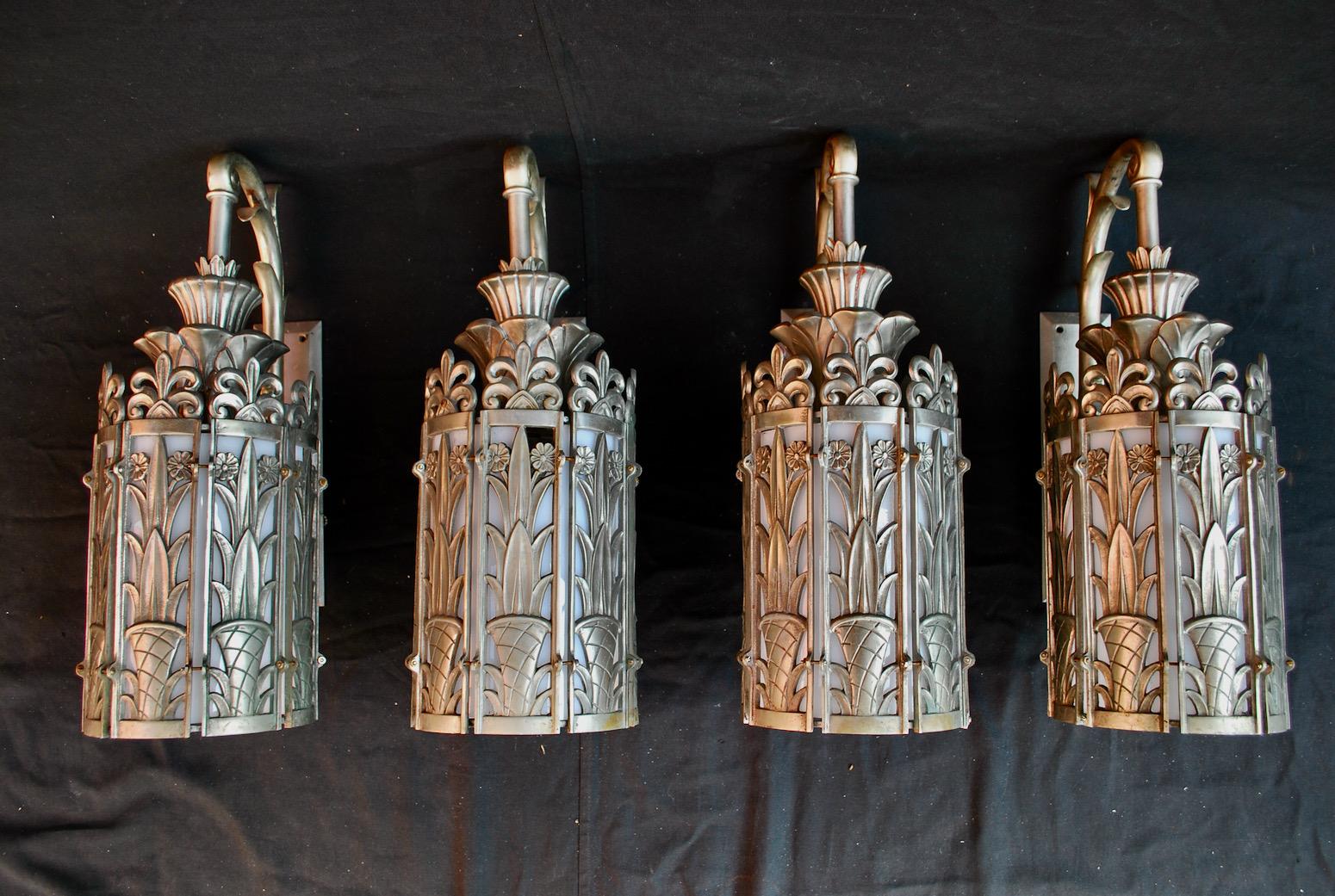 Wow that set of four French Art Deco bronze sconces are exceptional beautiful, I have been selling Antique lights for 25 years, it is the first time I get such beautiful set, I have to admit I bought them from another Antiques dealer, this is how