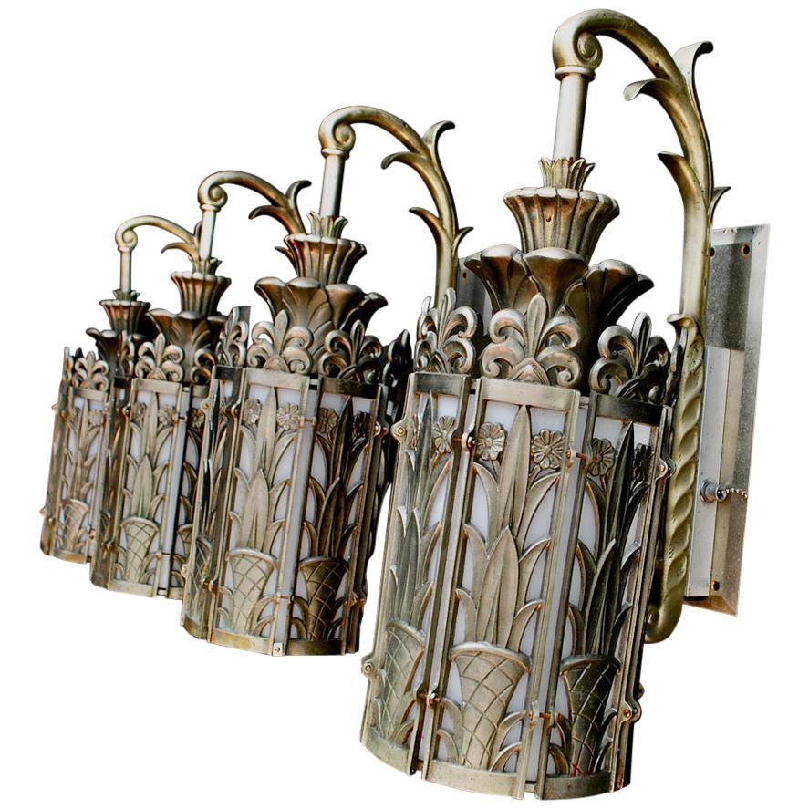 Exceptional and Very Rare Set of Four Large French Art Deco Bronze Sconces For Sale
