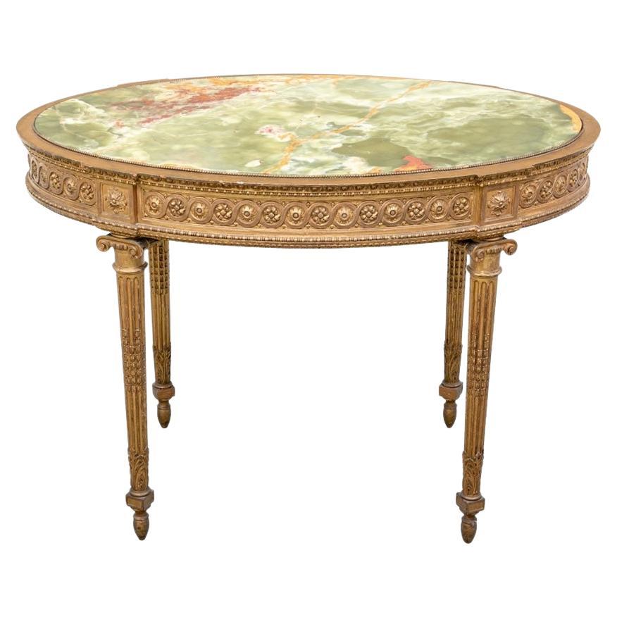Exceptionnelle table centrale néoclassique ancienne sculptée et dorée avec plateau en onyx