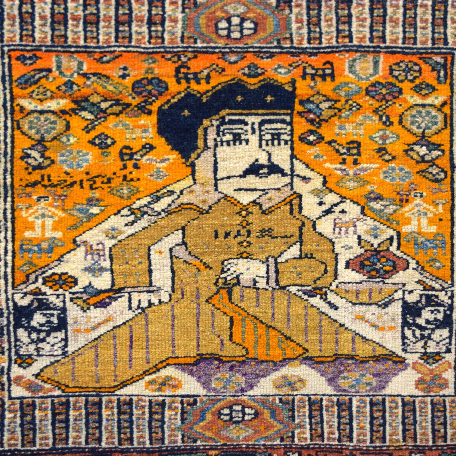 In mint condition, this small hand-knotted Persian carpet measures 2’ x 1’11” and features the inspiring and legendary Persian ruler, Karim Khan Zand. Crafted circa 1880, this carpet has an immense amount of detail within the foreground and border,