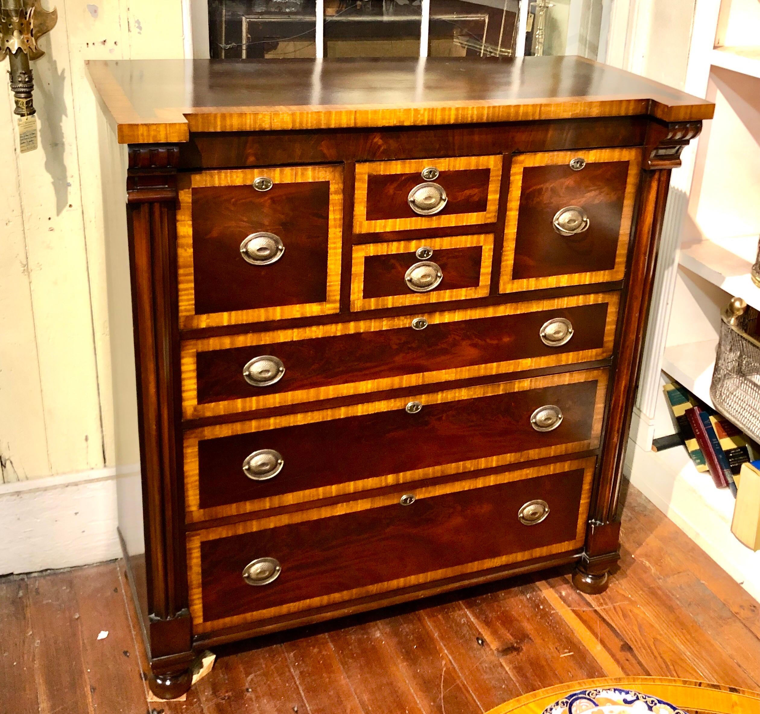 This extraordinary Antique Scottish early to mid 19th century chest of drawers is wonderful and typical of the multi-drawer configuration with large column-like baluster ends terminating in bunn feet. The chest is in remarkable, age-appropriate