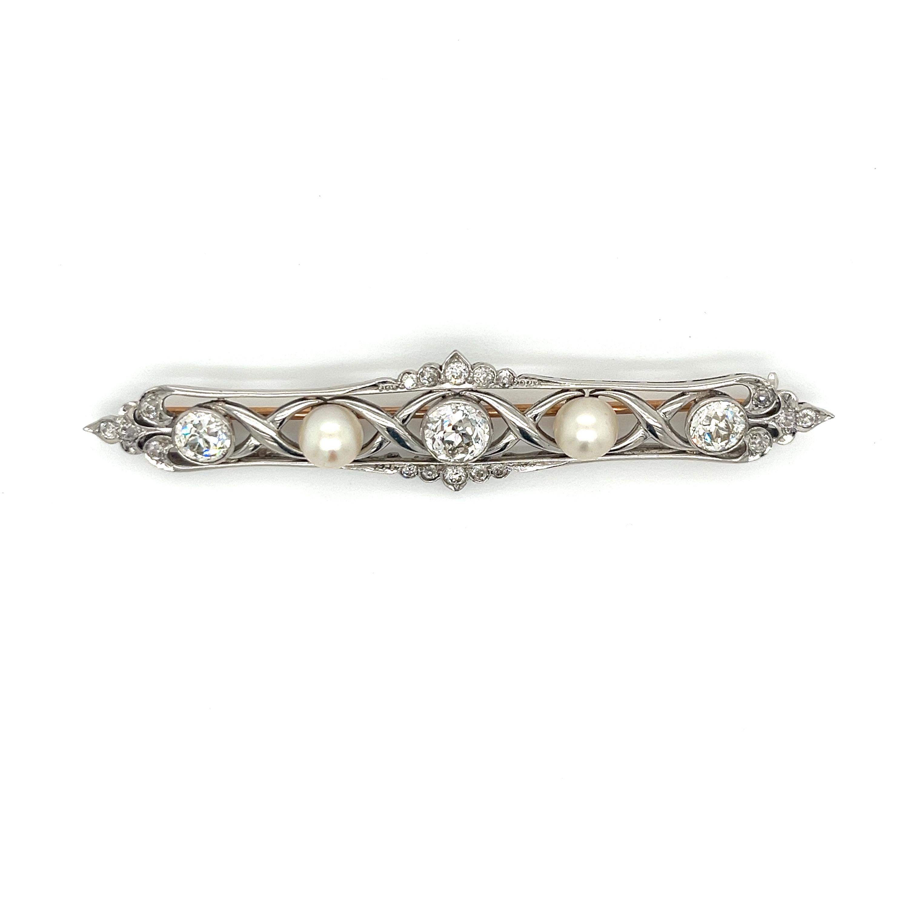 Exceptional Art Deco Platinum and Diamond Brooch, Circa 1930s

Overview
An exquisite Art Deco platinum brooch featuring a stunning arrangement of Old European cut diamonds and cultured saltwater pearls. This elegant piece epitomizes the glamour and