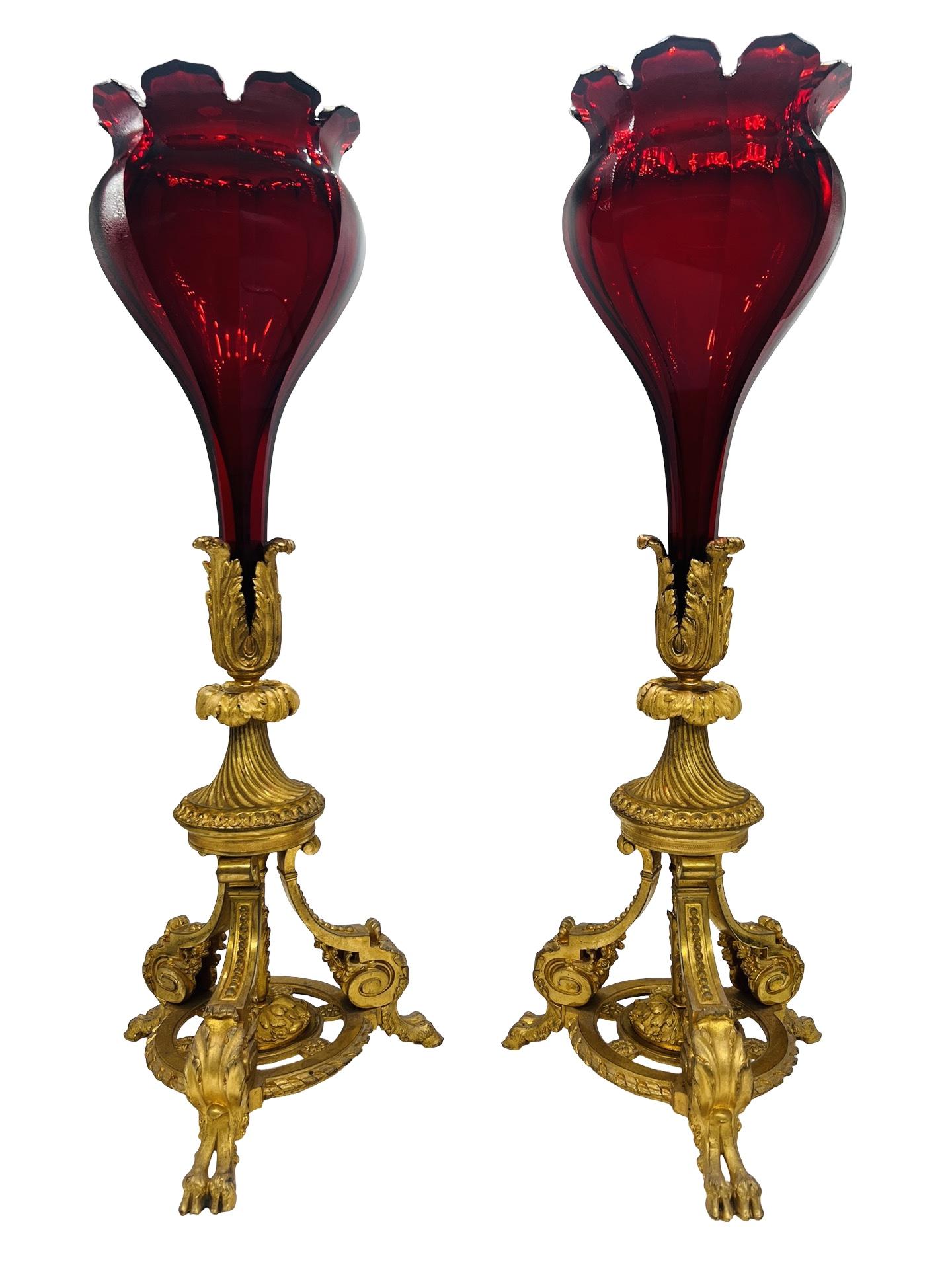 Baccarat (French, founded 1764), circa mid to late 19th century.

This pair of magnificent and highly unusual glass and bronze ormolu trumpet vases are almost certainly created by the renowned French firm Baccarat. Baccarat’s history goes back to